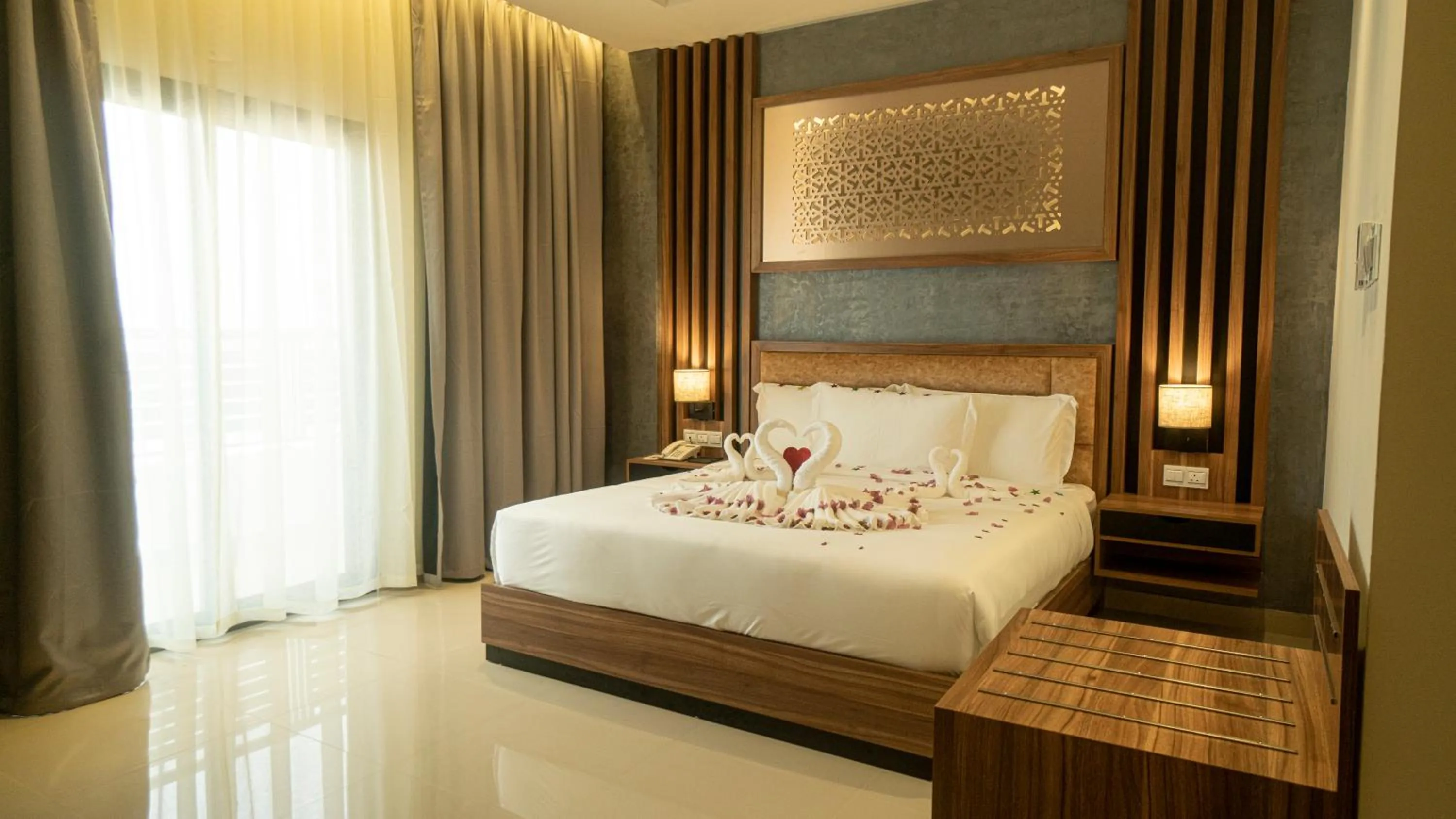 Bed in The Plaza Hotel & Resort