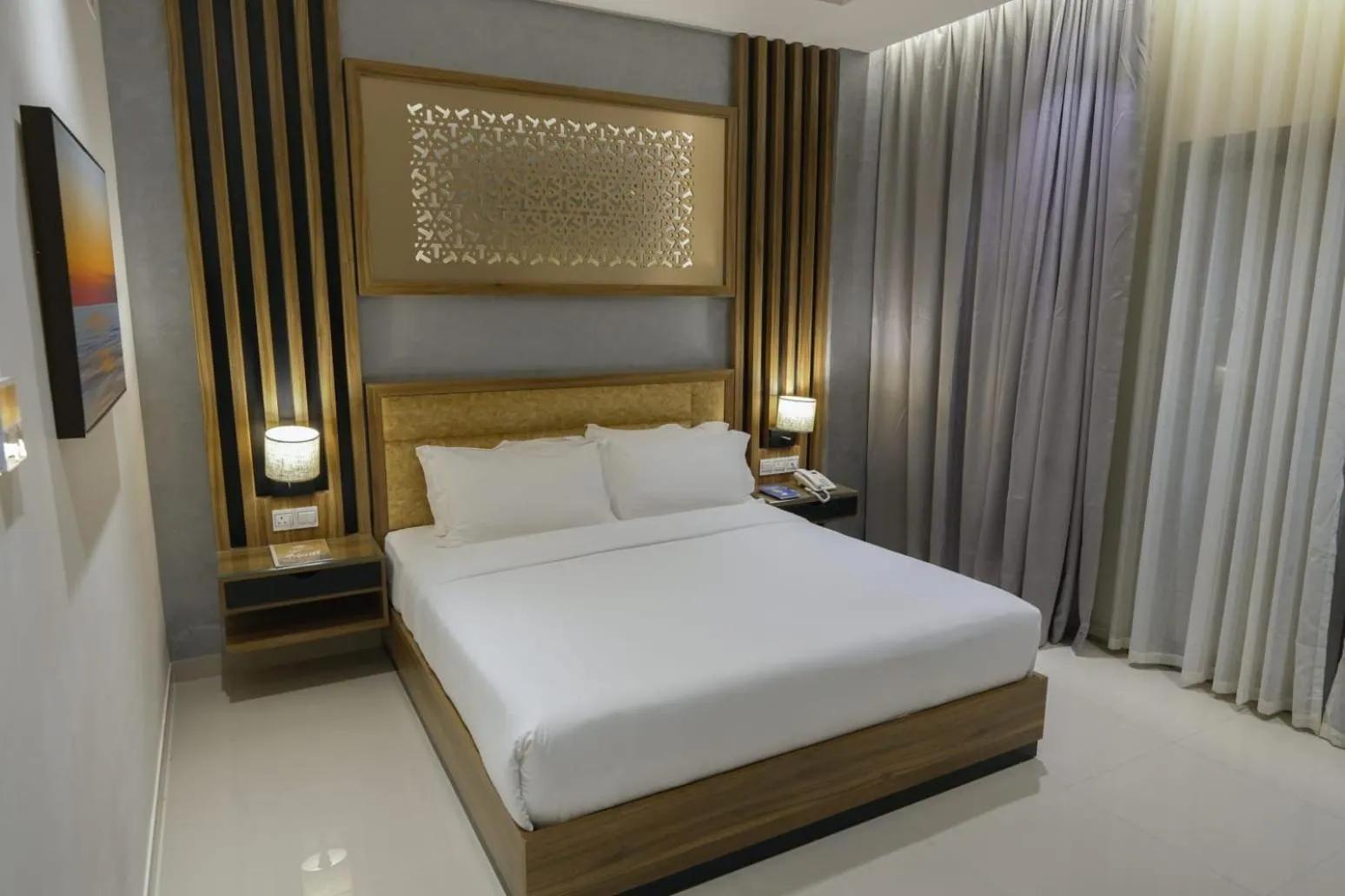 Bed in The Plaza Hotel & Resort