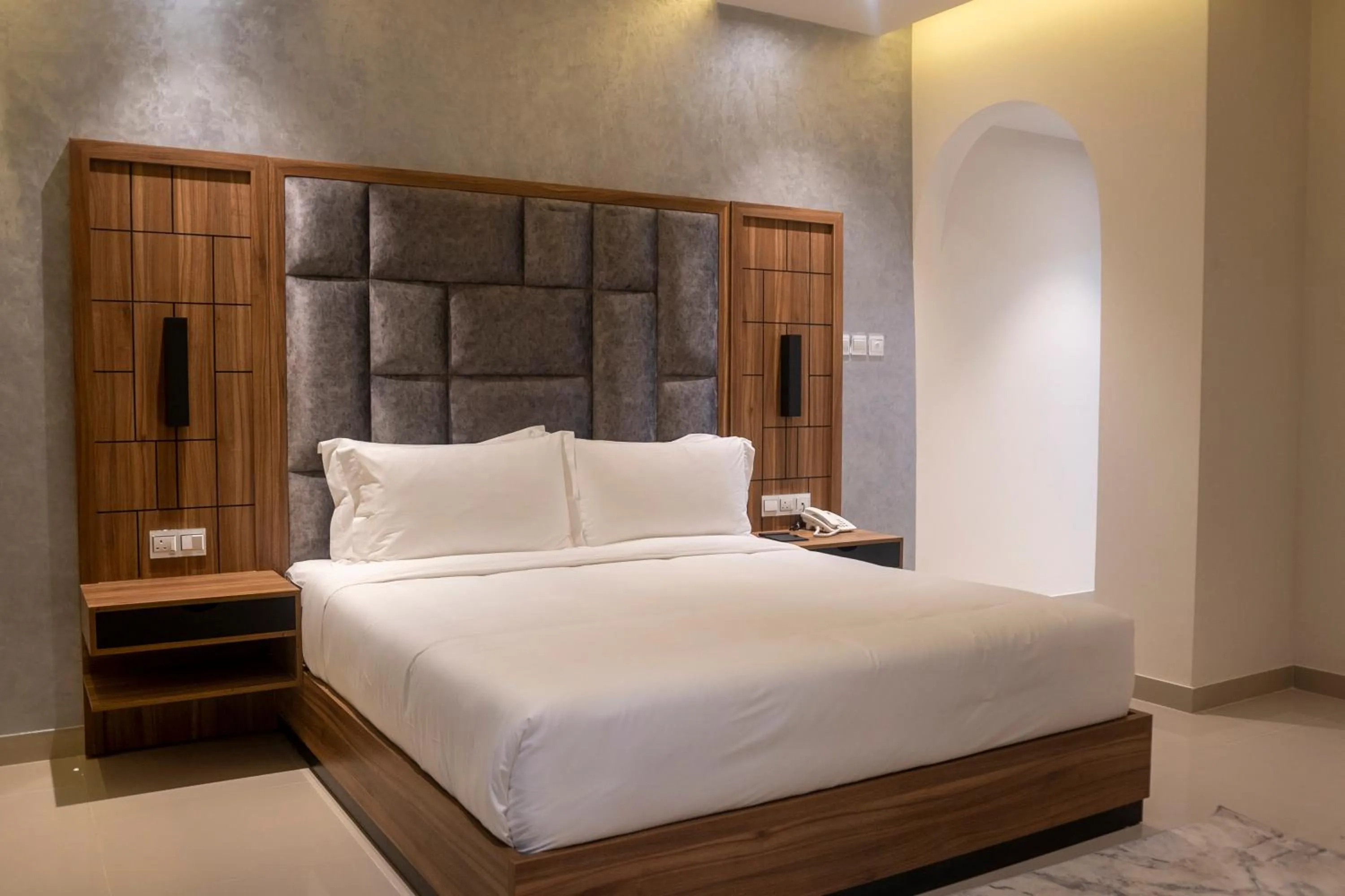 Bed in The Plaza Hotel & Resort