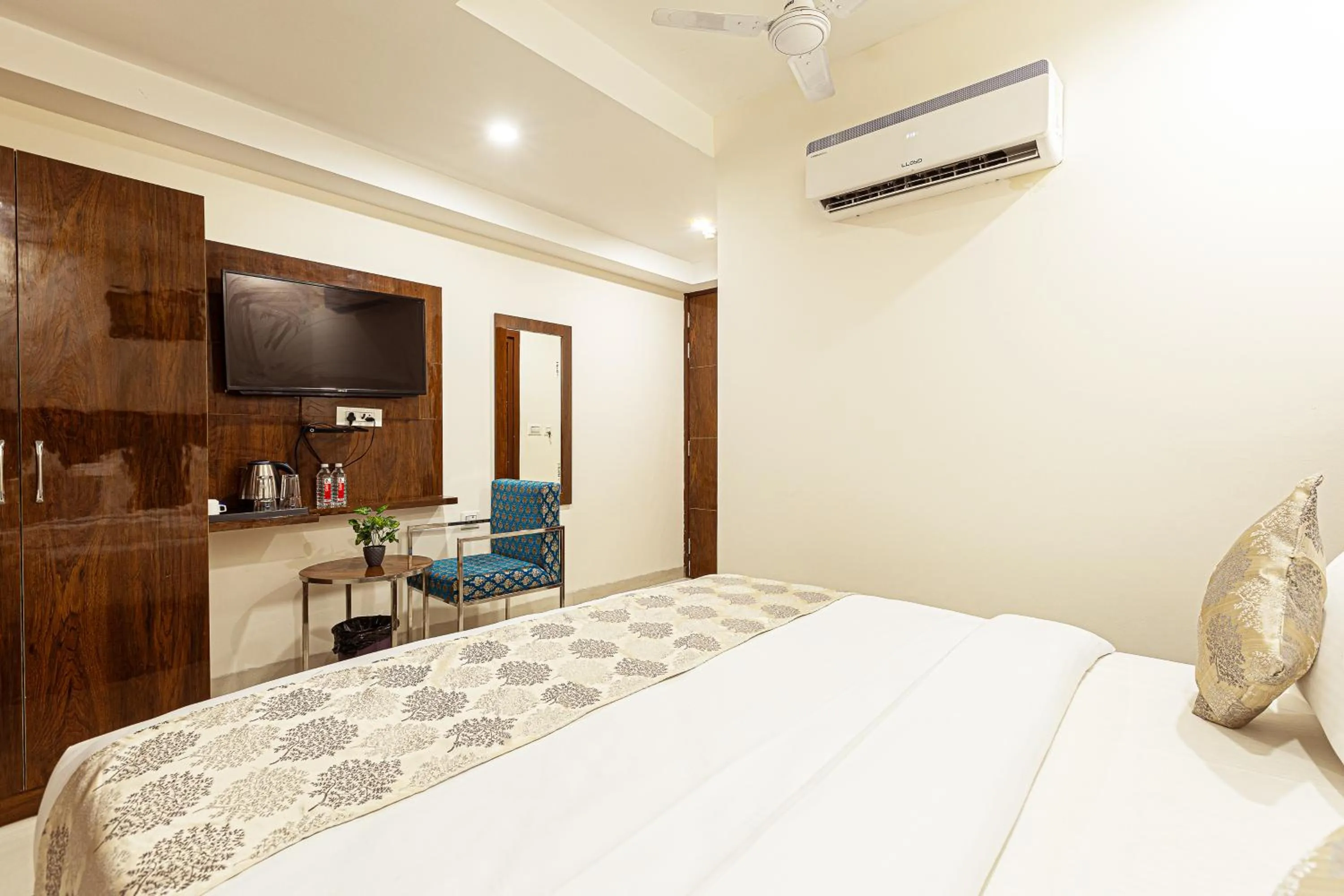 Bed in Hotel Emblem Suites- Near Delhi Airport