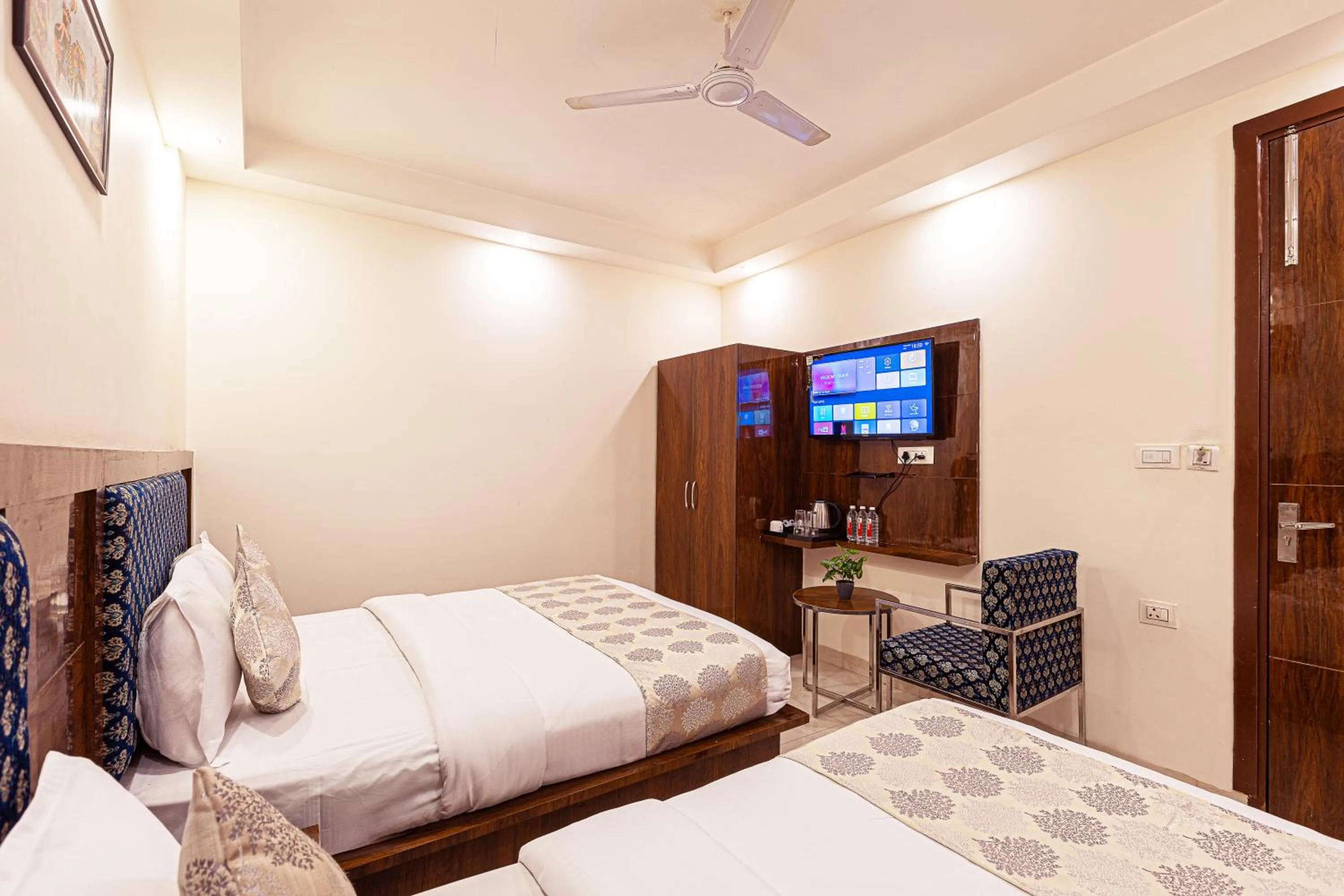 Bed in Hotel Emblem Suites- Near Delhi Airport