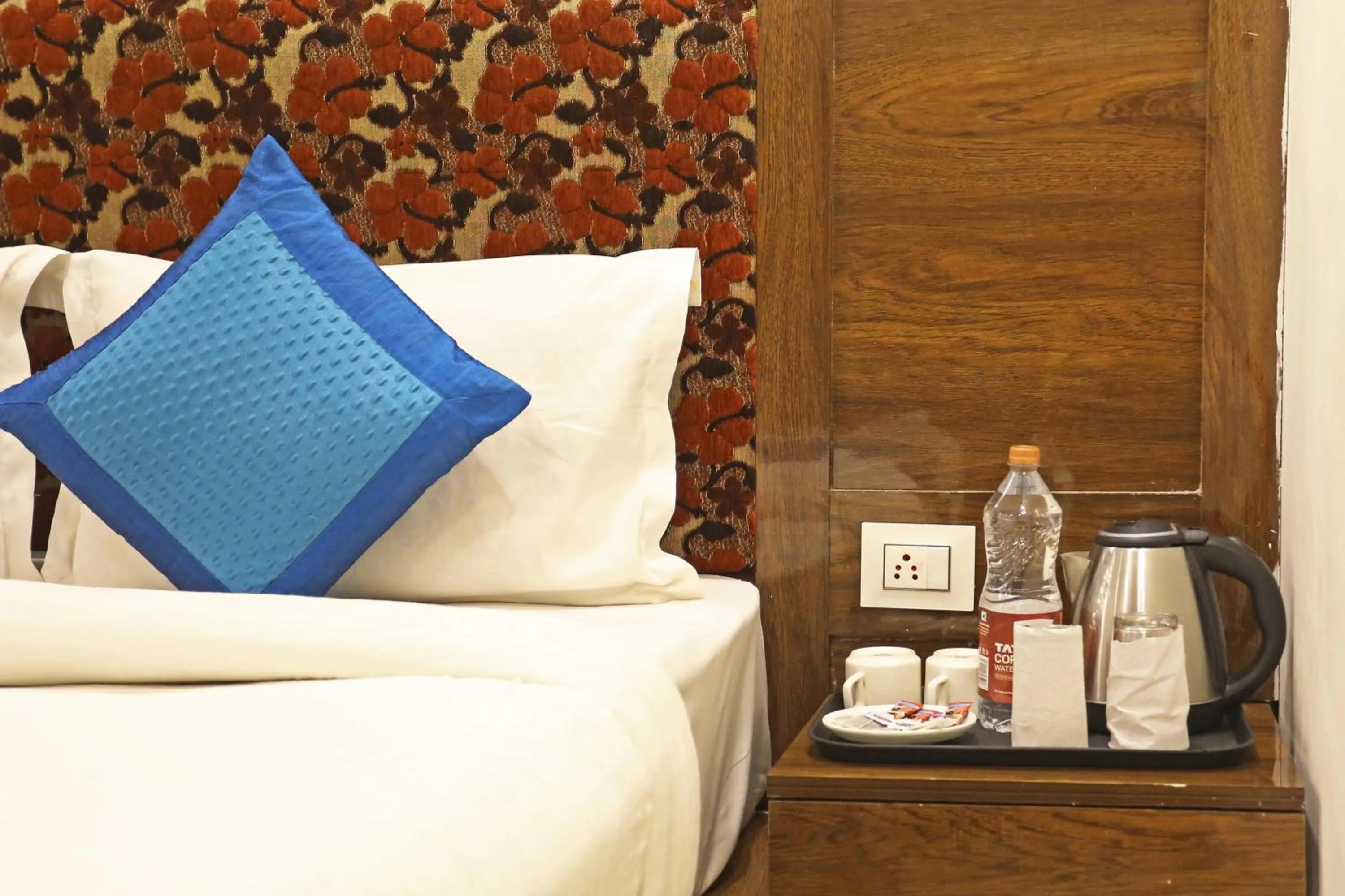 Coffee/tea facilities, Bed in Hotel Emblem Suites- Near Delhi Airport
