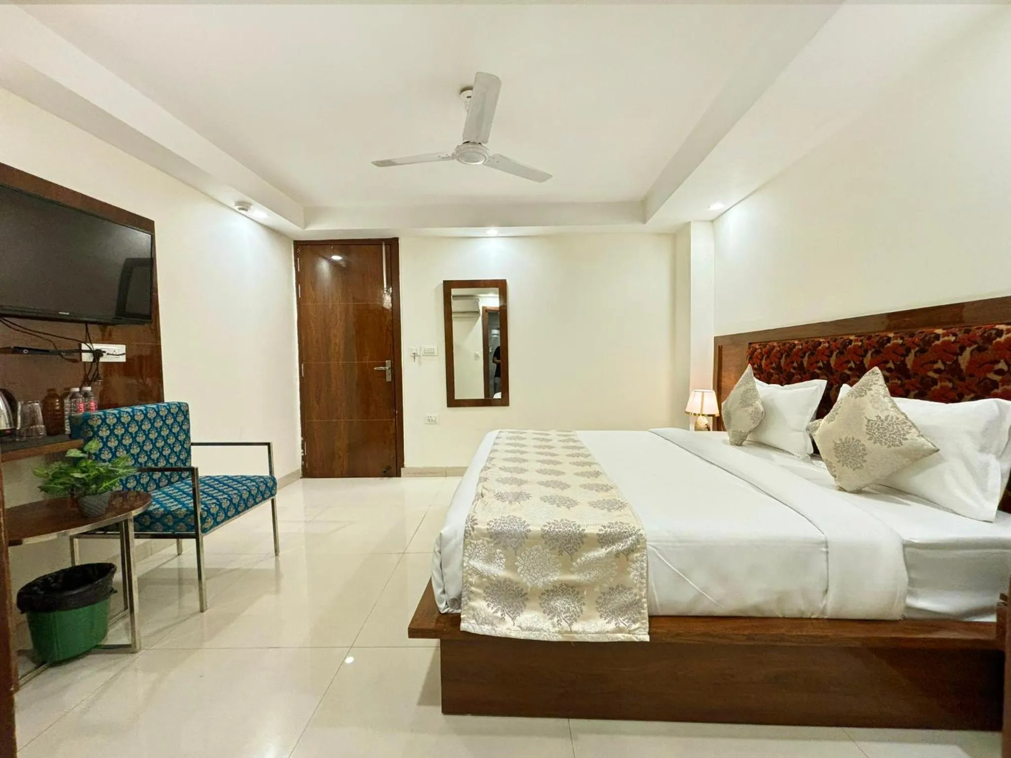 Bed in Hotel Emblem Suites- Near Delhi Airport