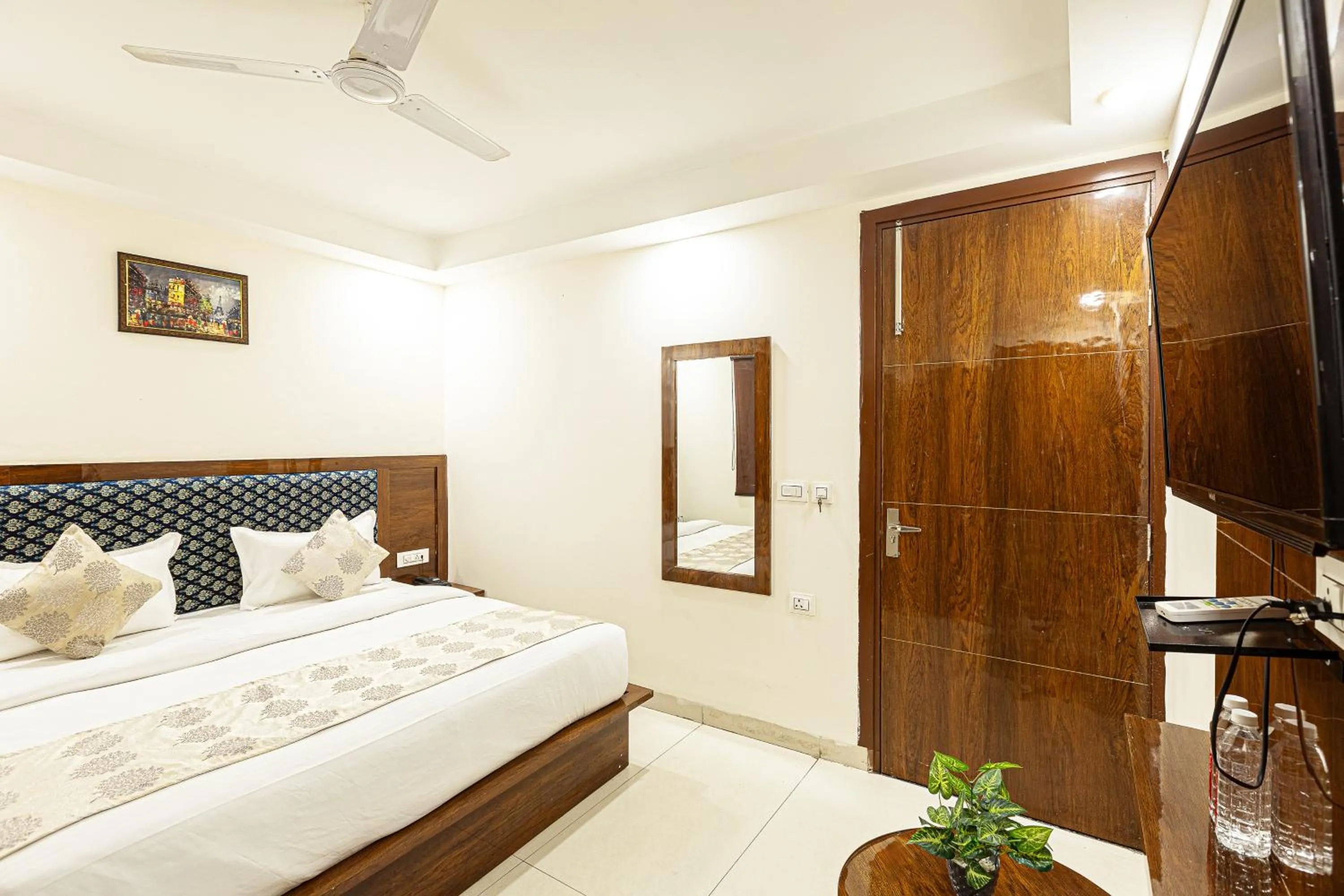 Bed in Hotel Emblem Suites- Near Delhi Airport