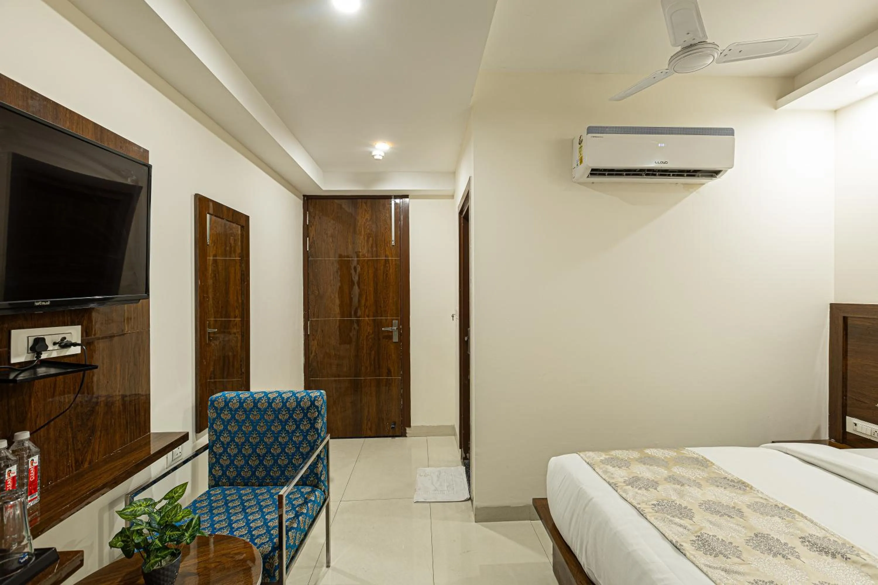 Bed in Hotel Emblem Suites- Near Delhi Airport