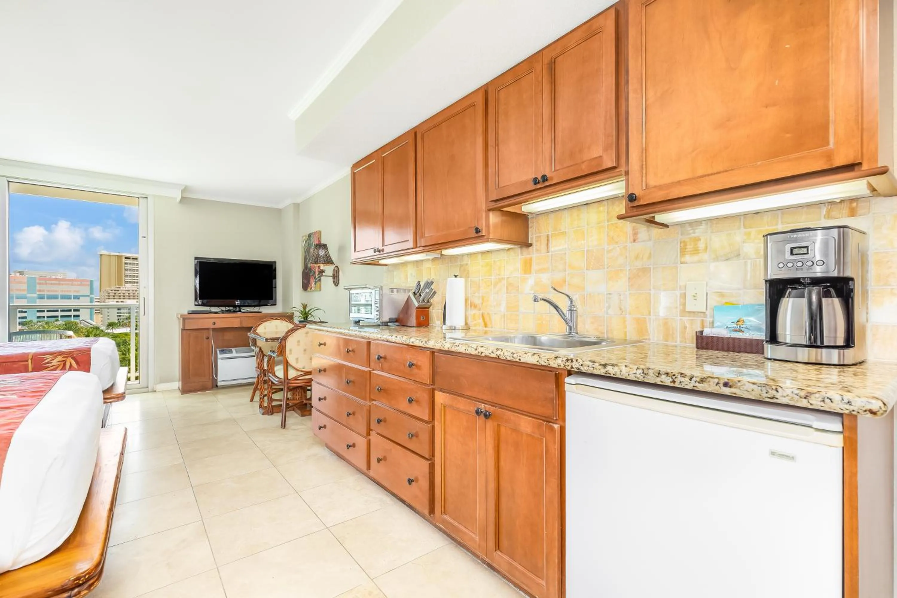 Kitchen or kitchenette in Luana Waikiki Hotel & Suites
