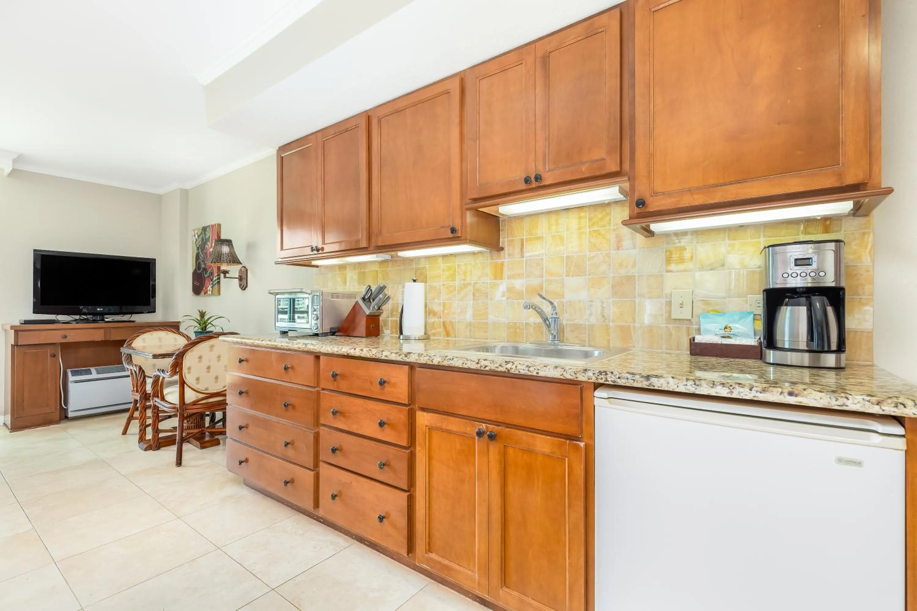 Kitchen or kitchenette in Luana Waikiki Hotel & Suites