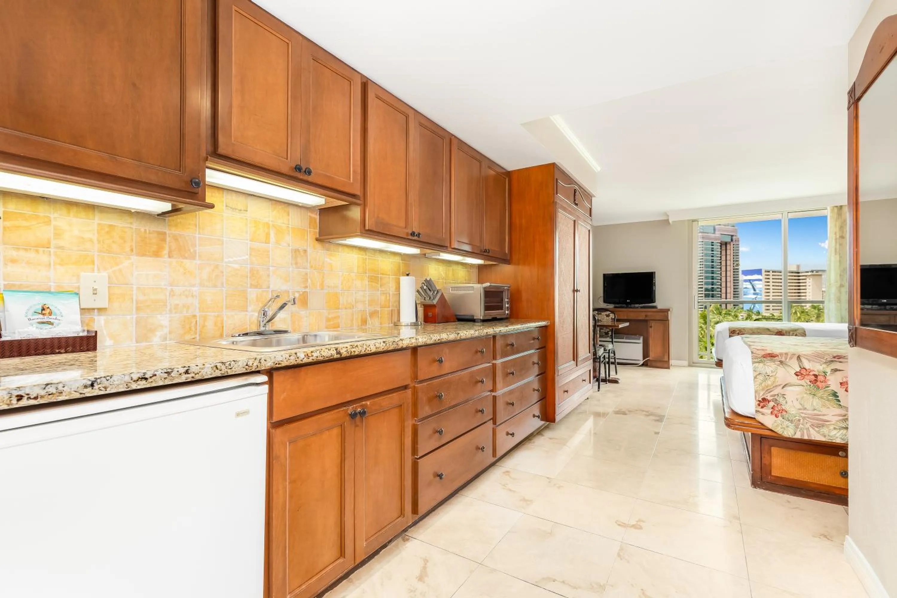 Kitchen or kitchenette in Luana Waikiki Hotel & Suites