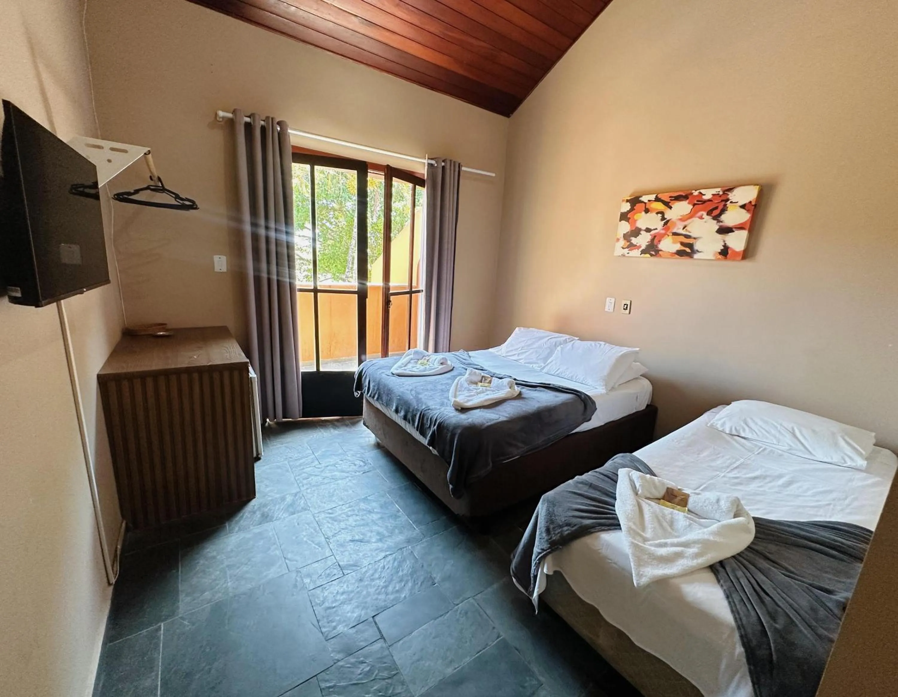 Bed in Pousada Ponta dos Corais