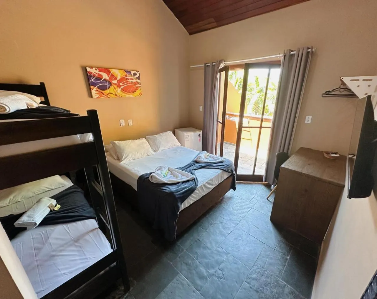 Bed in Pousada Ponta dos Corais