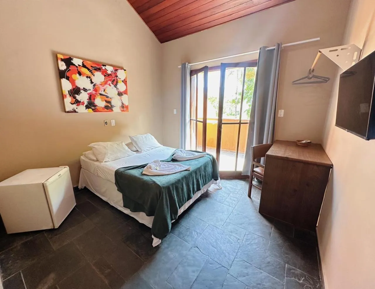 Bed in Pousada Ponta dos Corais