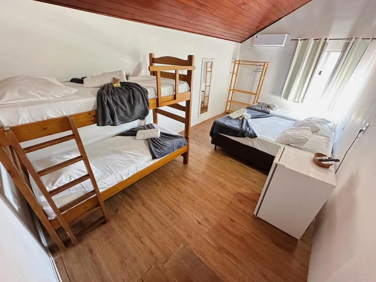 Bed in Pousada Ponta dos Corais