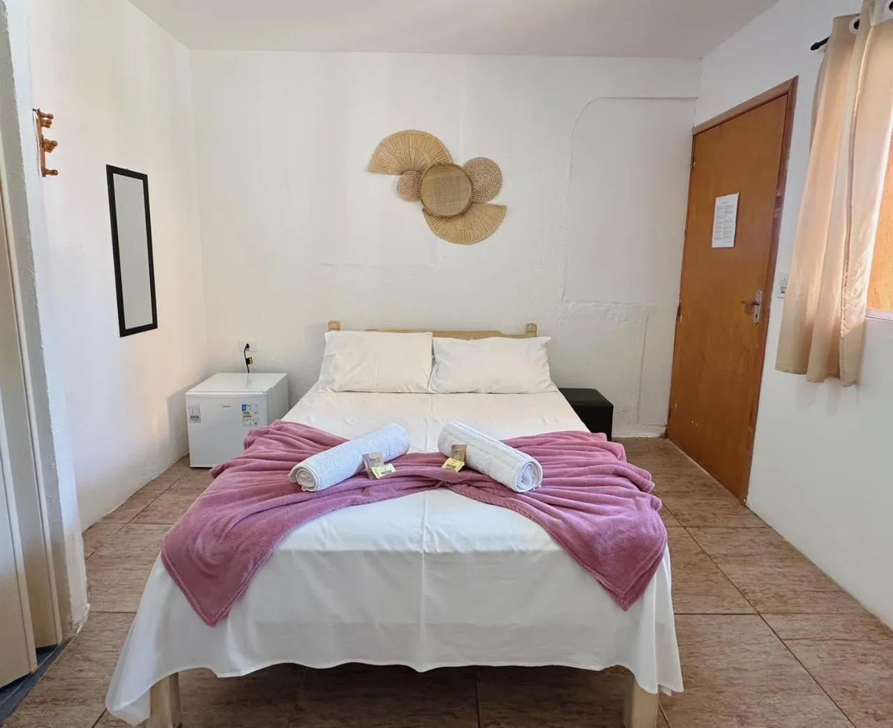 Bed in Pousada Ponta dos Corais