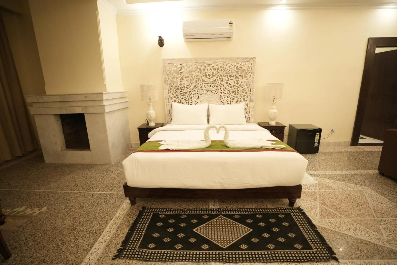 Bed in Gautam Hotels & Resorts