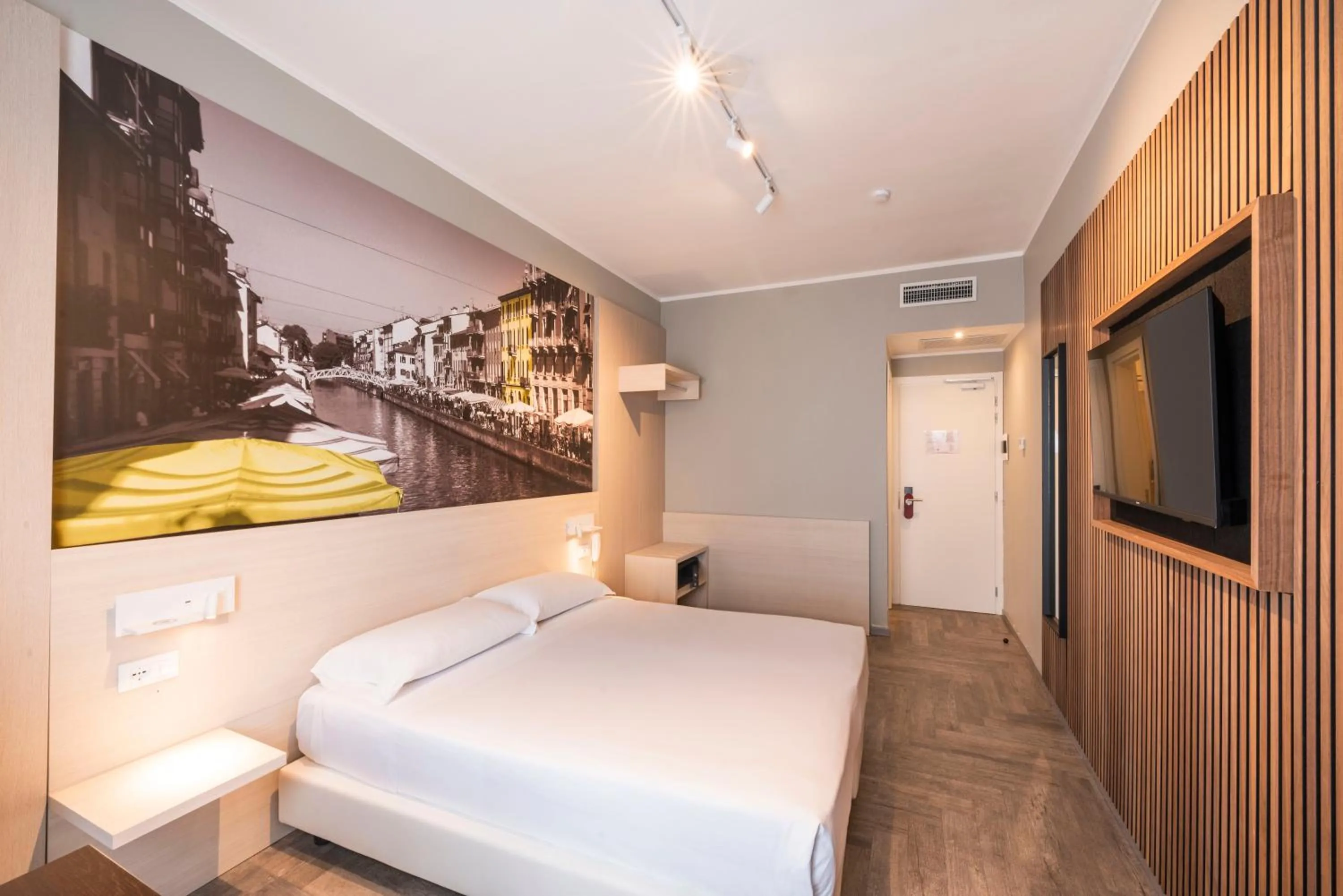 Bed in Kleos Hotel Milano Città Studi by Kleos Group Collection