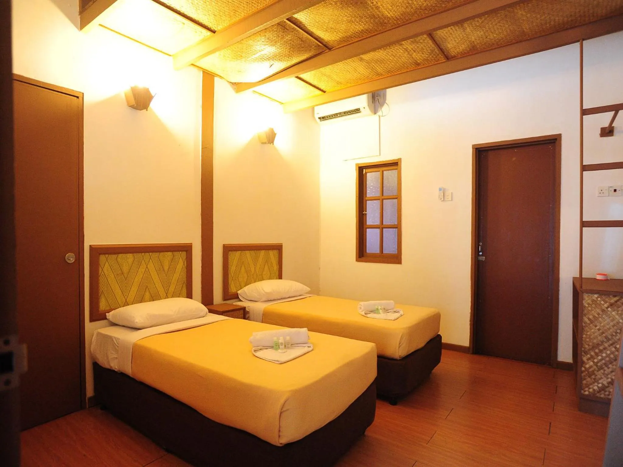 Bed in Redang Paradise Resort