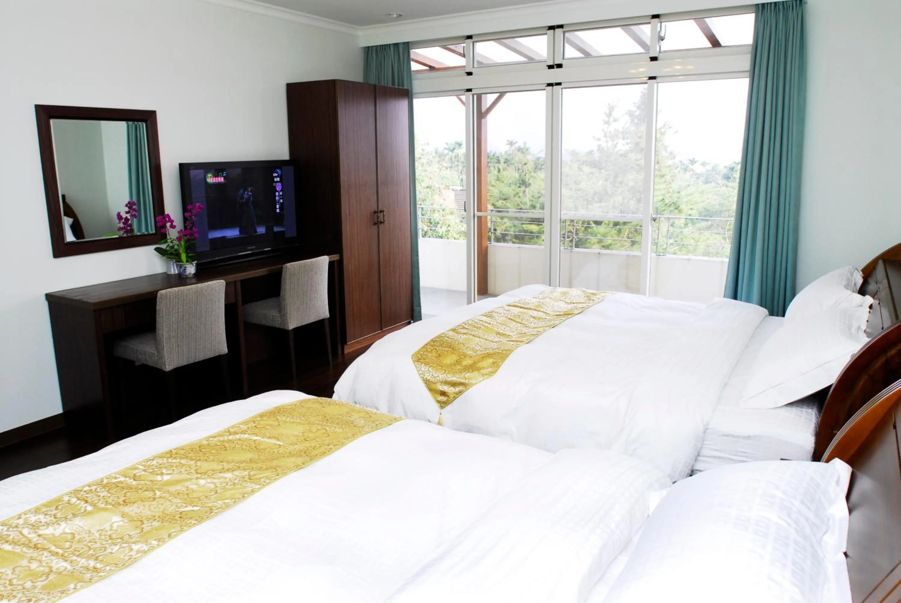 Bed in Zen and Pine Resort