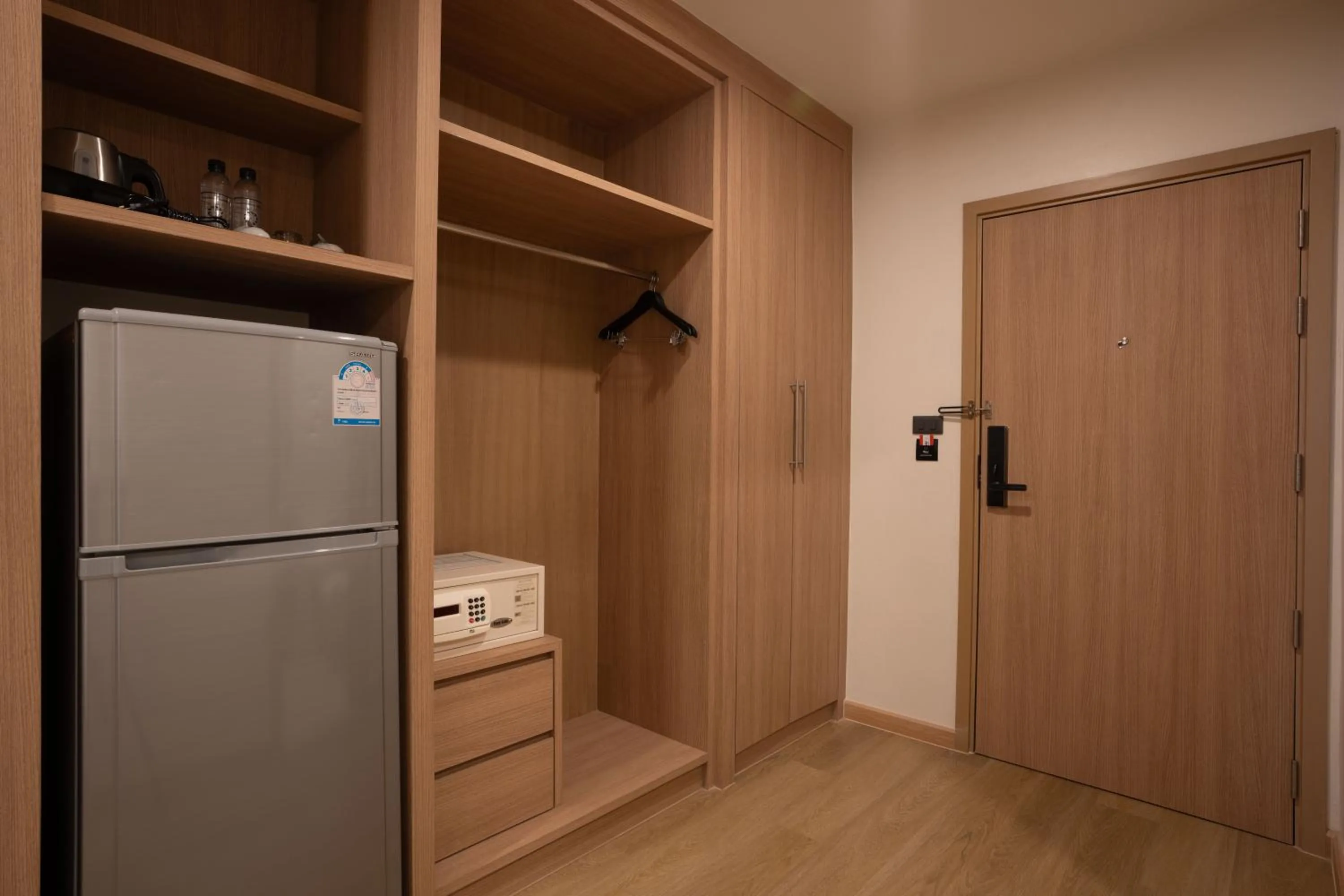 wardrobe in CA Hotel and Residence Phuket - SHA Extra Plus