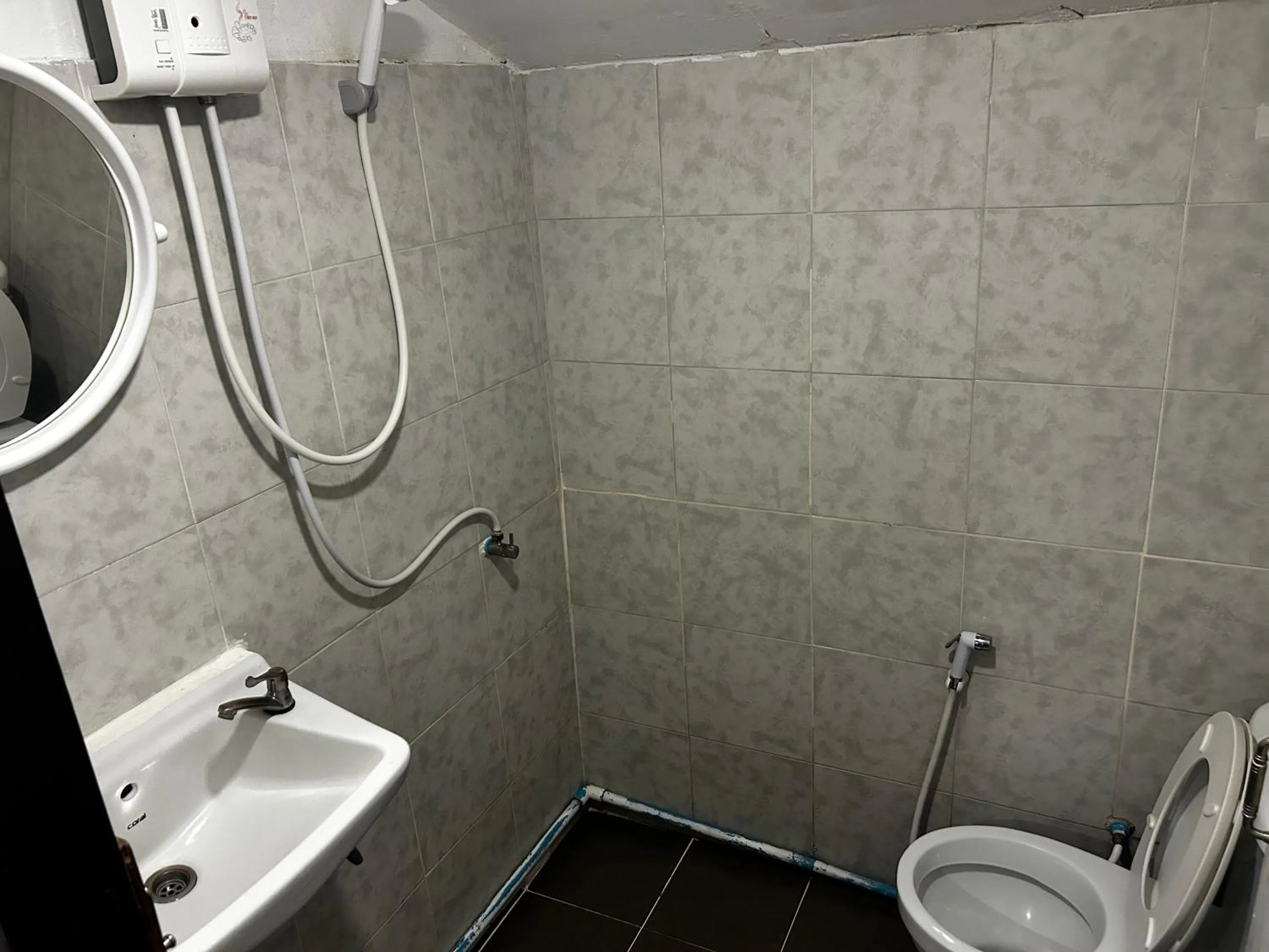 Toilet in Coco's Guest House