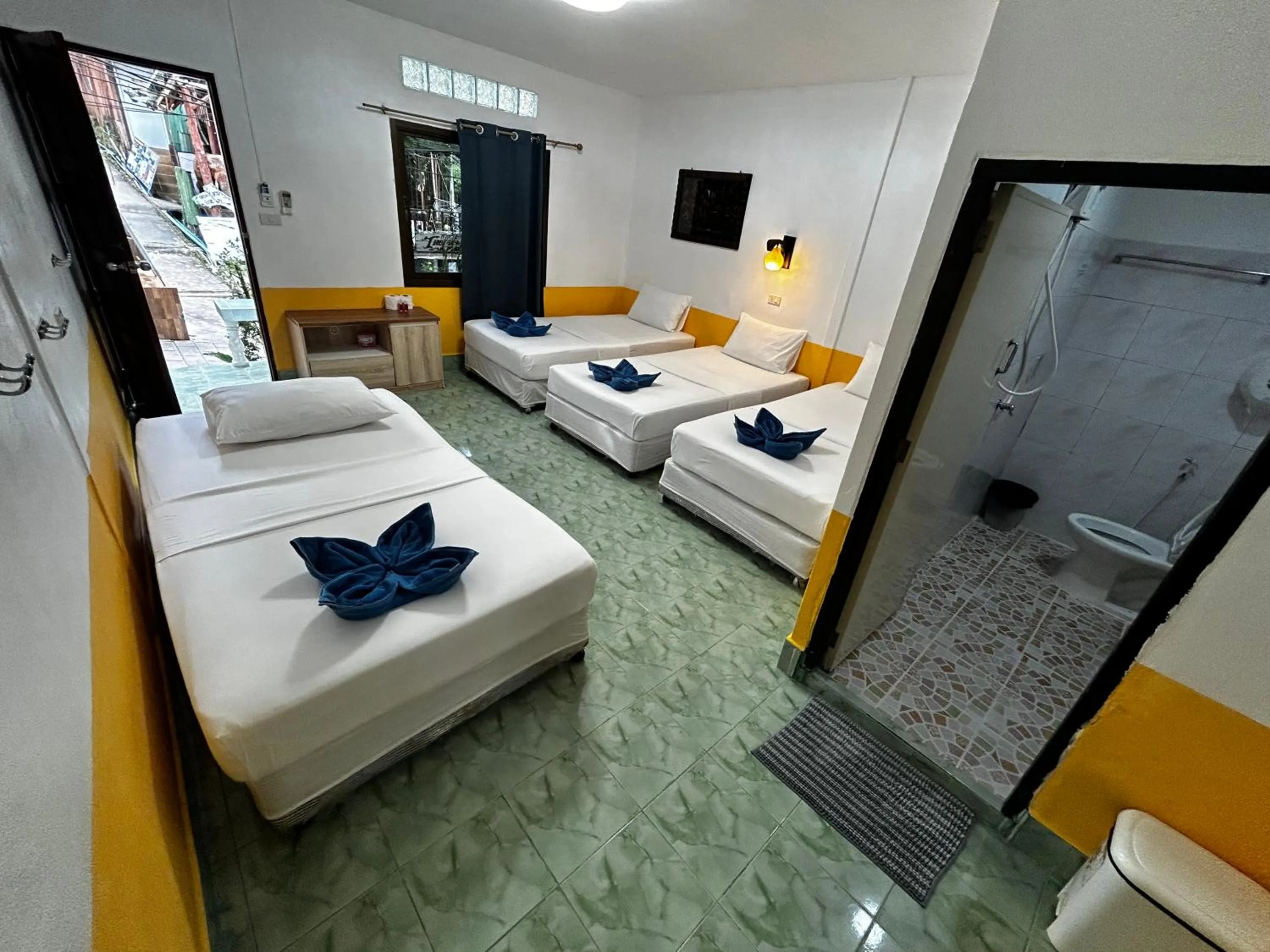 Bed in Coco's Guest House