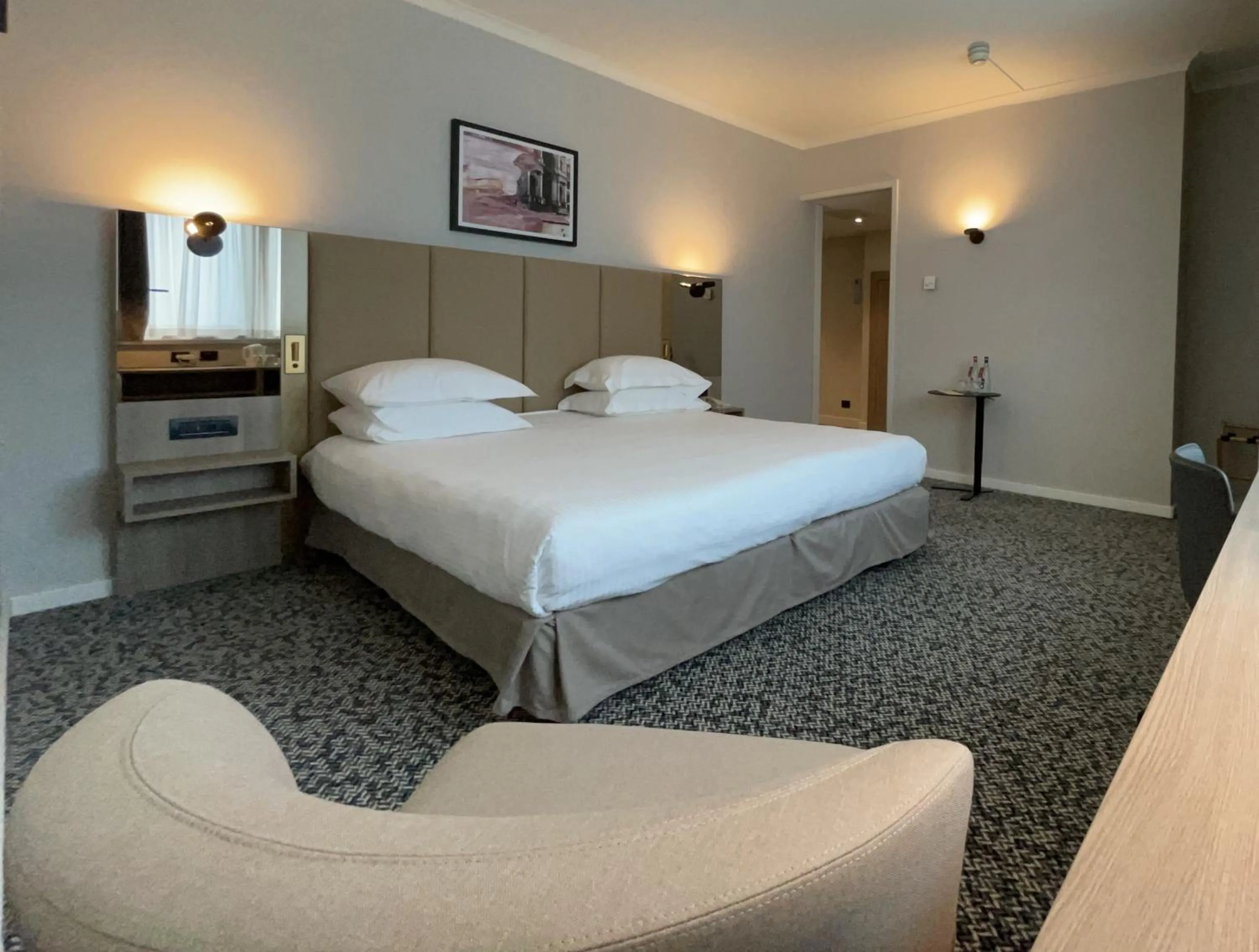 Photo of the whole room, Bed in Crowne Plaza Milan Linate by IHG