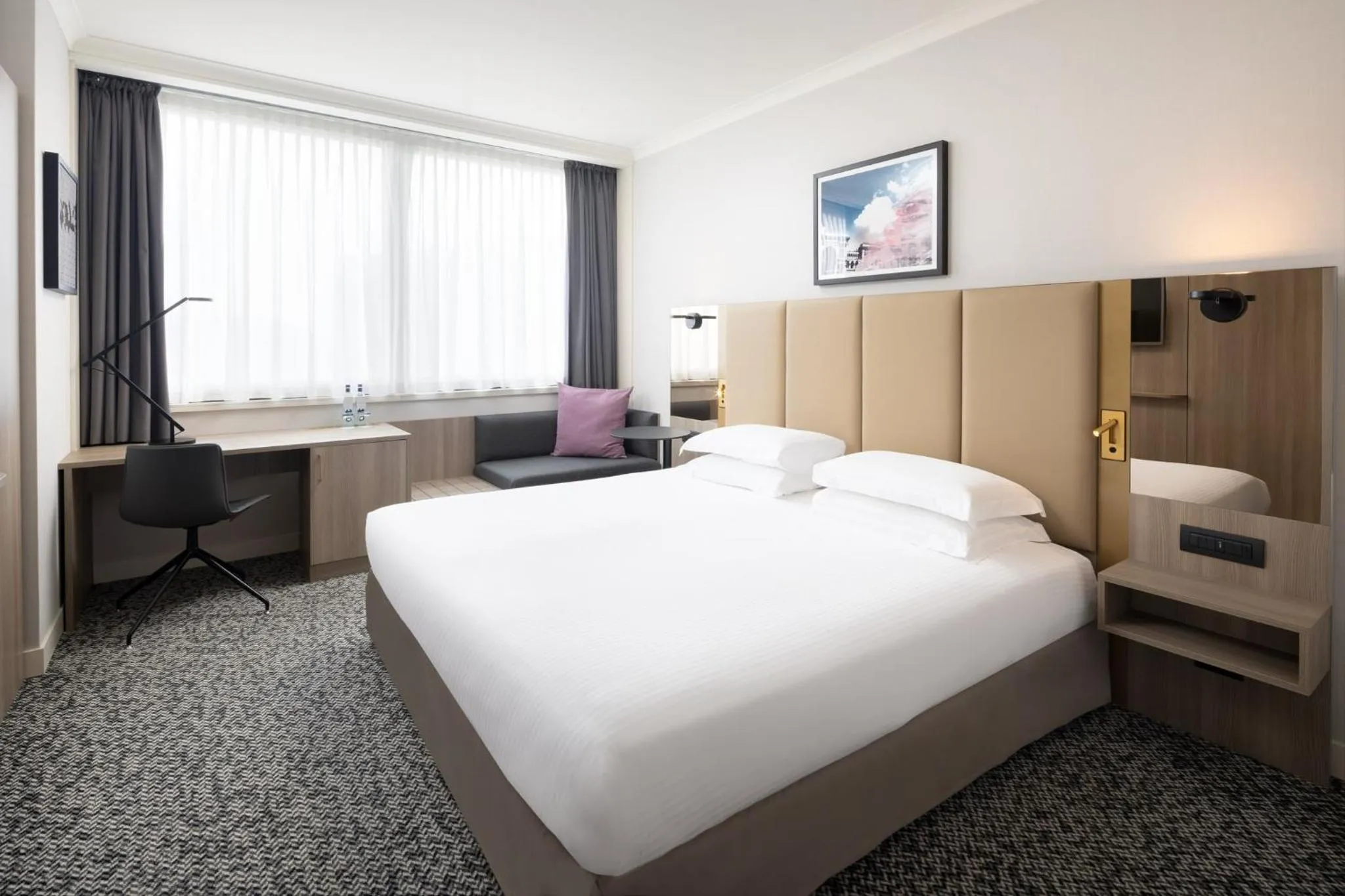Photo of the whole room, Bed in Crowne Plaza Milan Linate by IHG