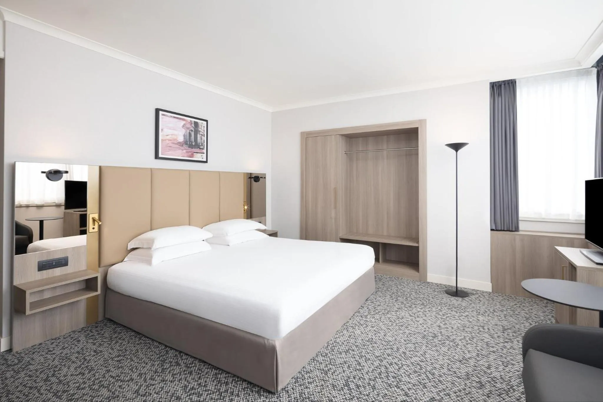 Photo of the whole room, Bed in Crowne Plaza Milan Linate by IHG