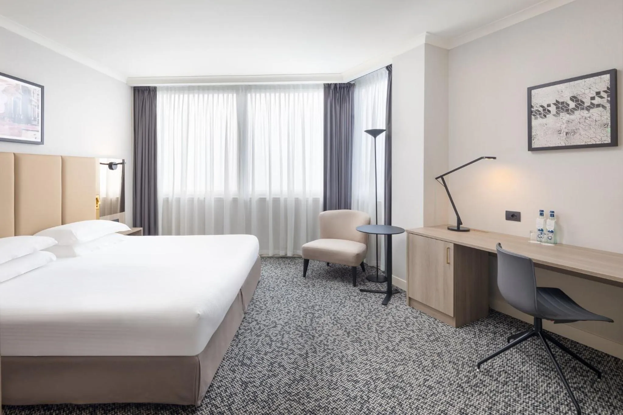 Photo of the whole room, Bed in Crowne Plaza Milan Linate by IHG