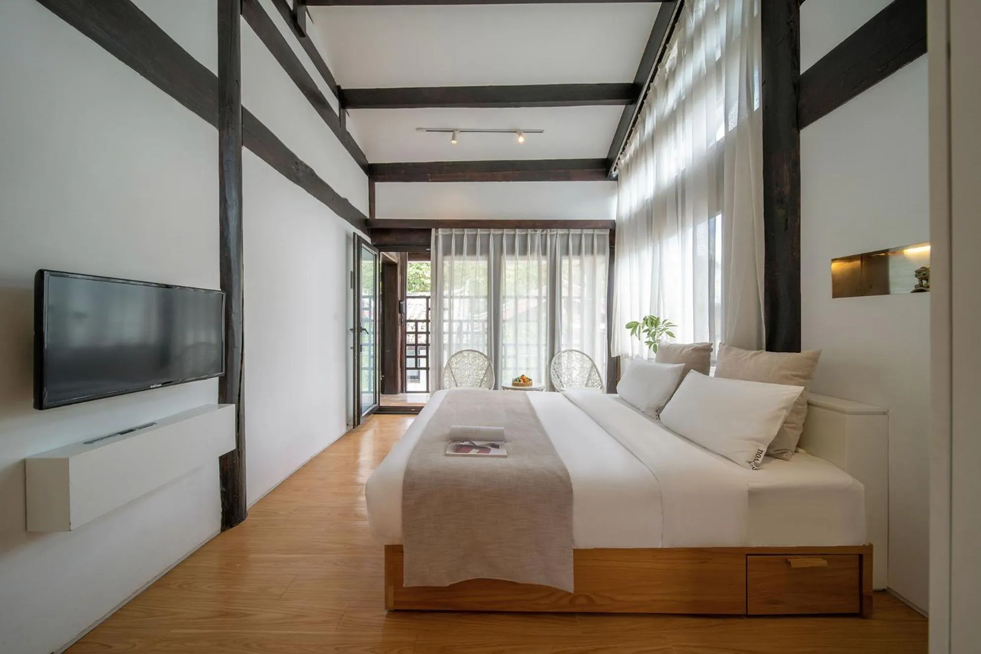 Photo of the whole room, Bed in The Bivou Lijiang