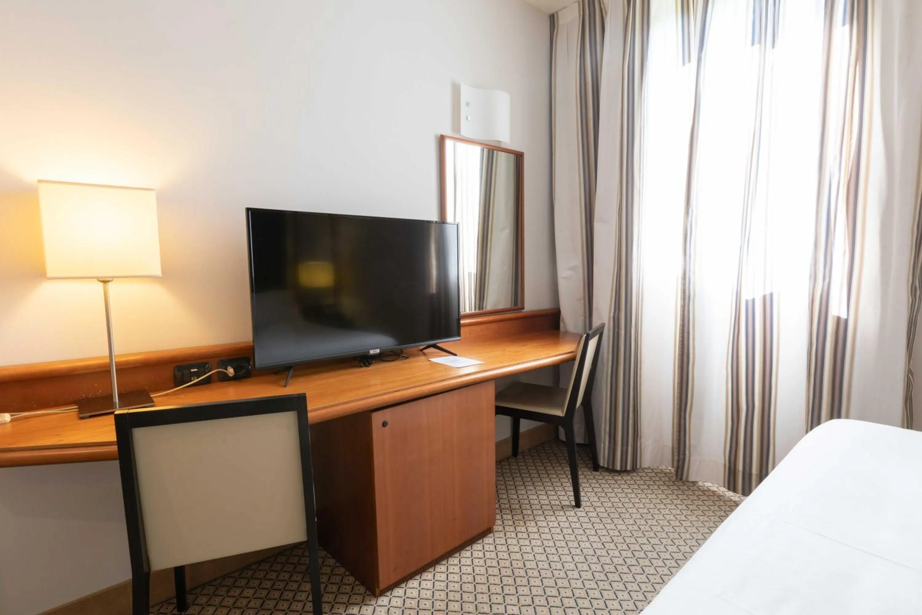 TV and multimedia, Bed in Belstay Milano Linate
