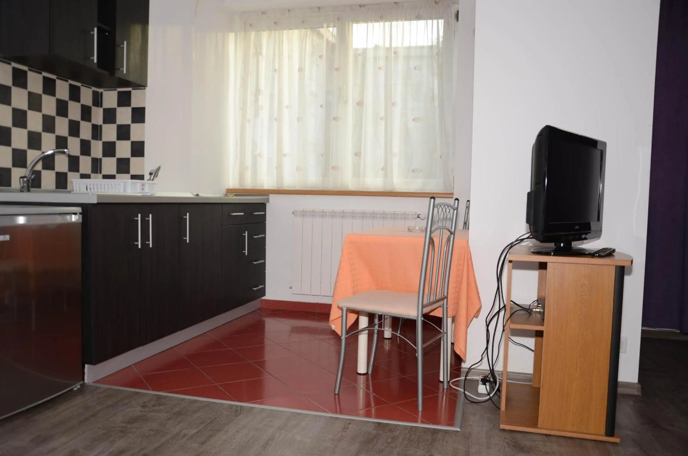 Kitchen or kitchenette in Apart La Cave