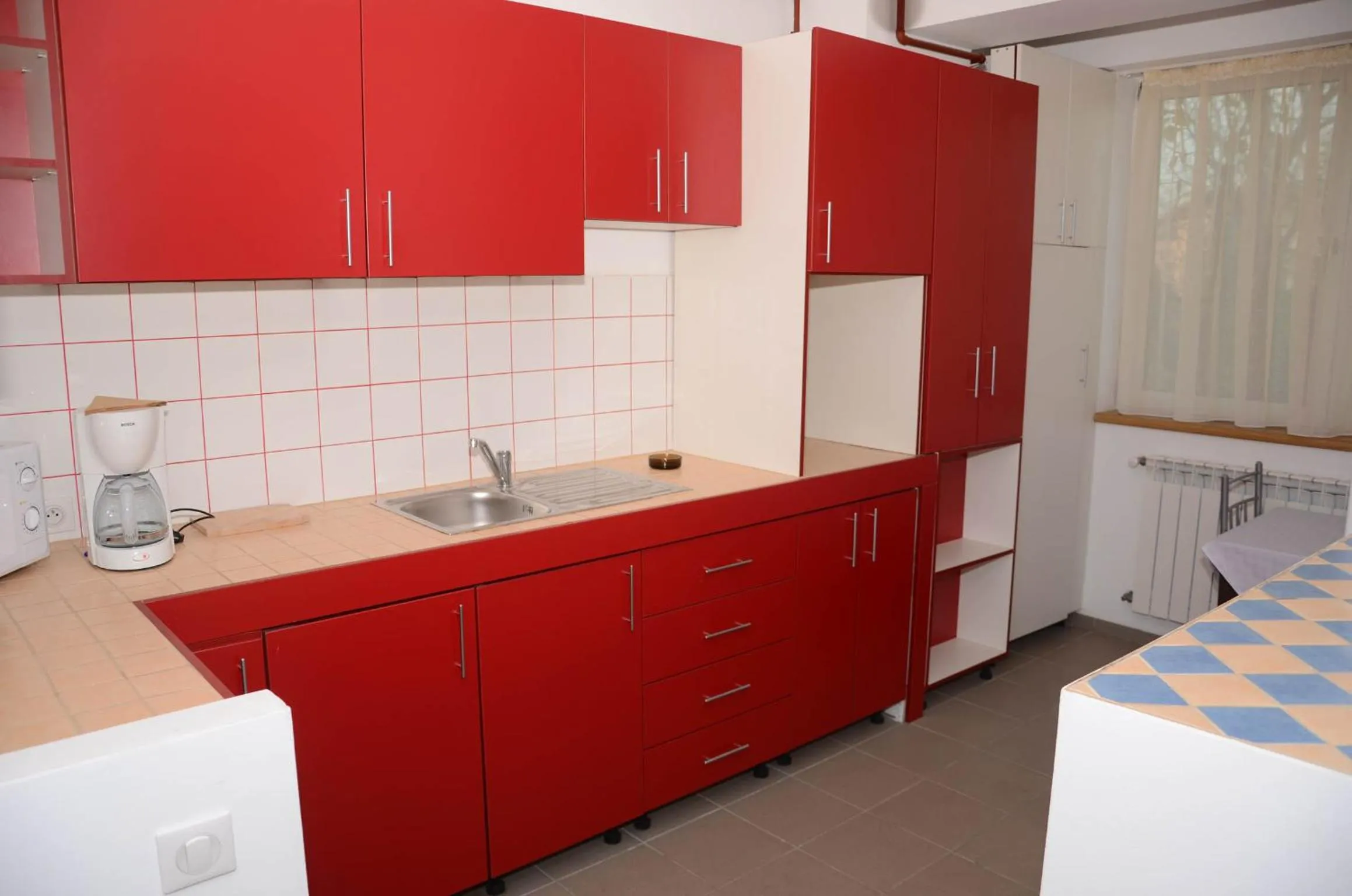 Kitchen or kitchenette in Apart La Cave