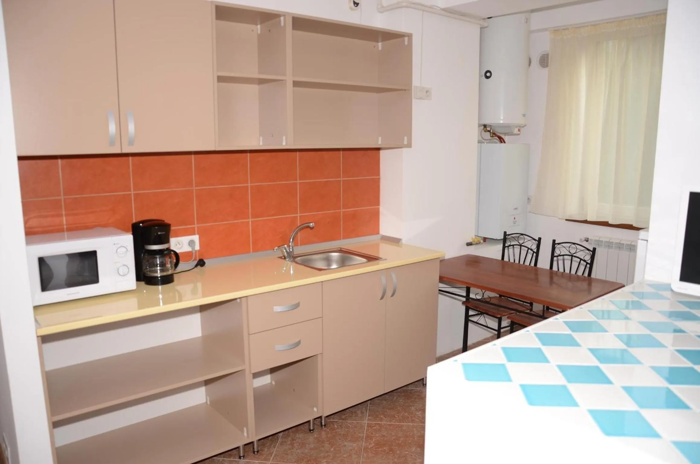 Kitchen or kitchenette in Apart La Cave