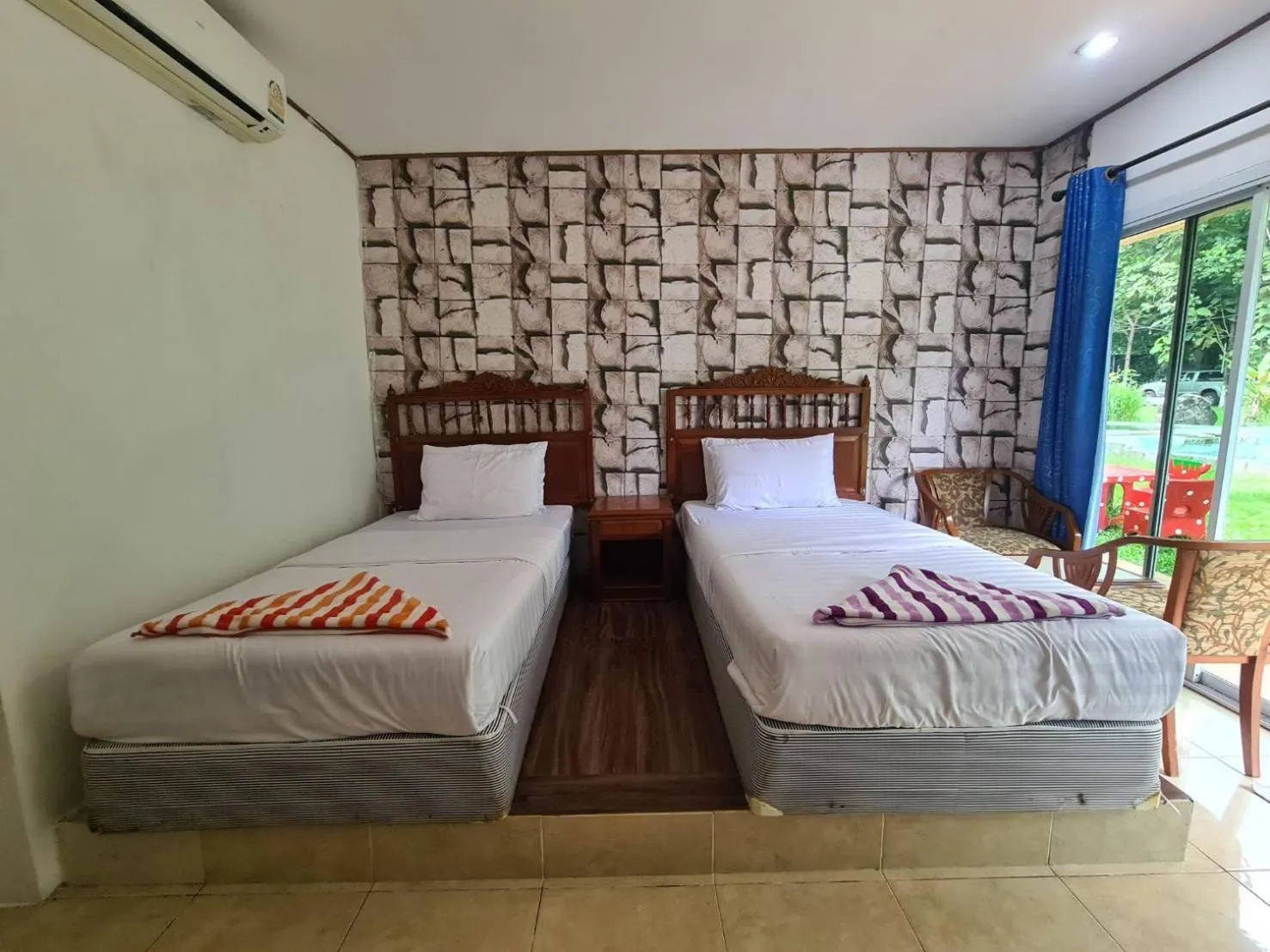 Bed in Phutawan Resort