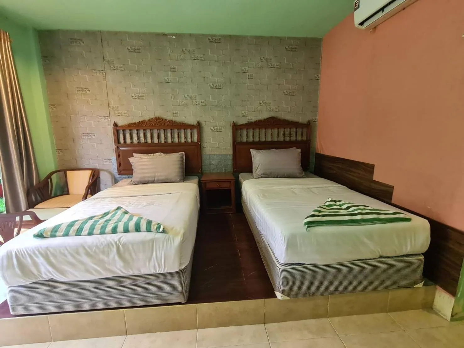 Bed in Phutawan Resort