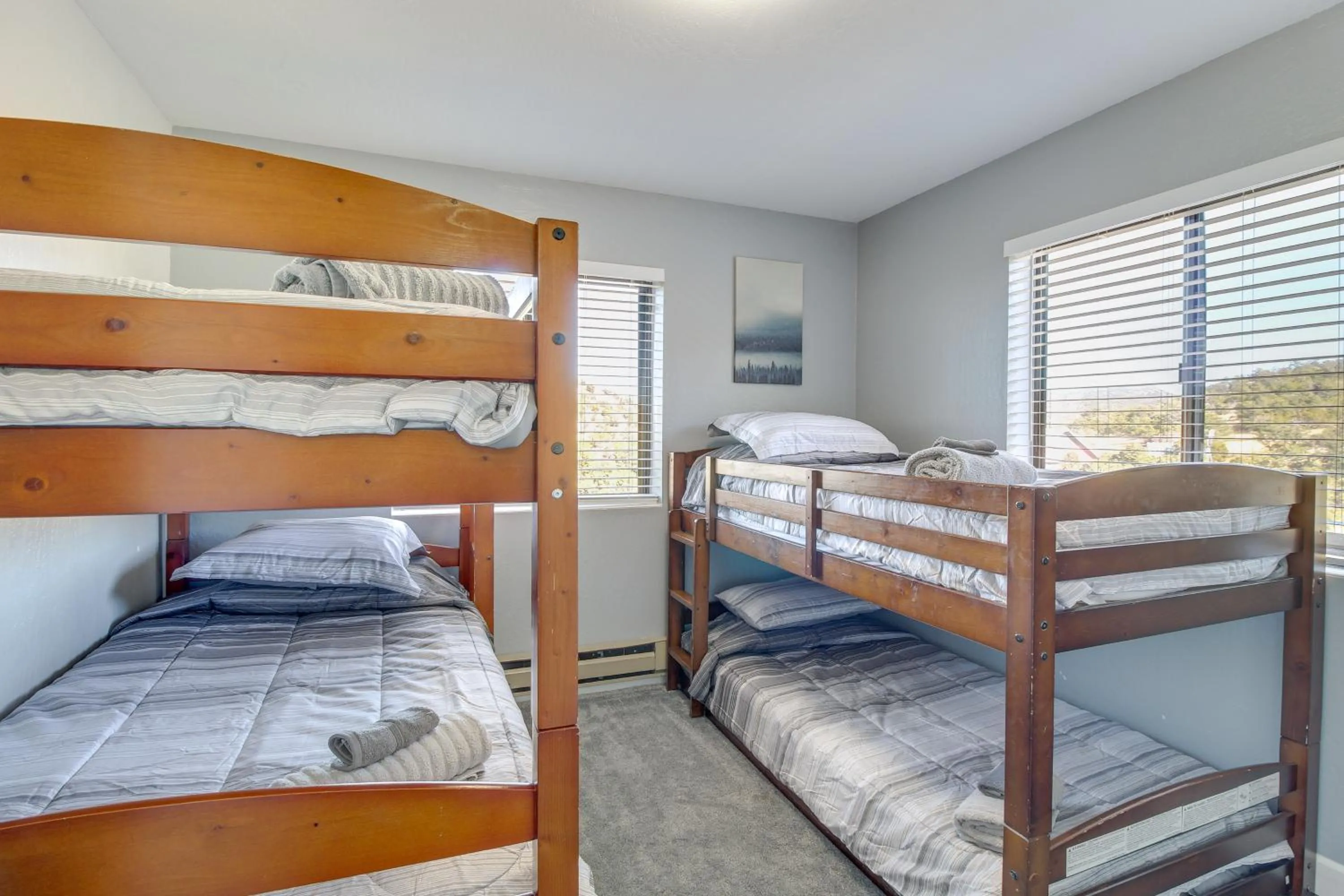 Bed in Eagar Vacation Rental Home with Spacious Deck!