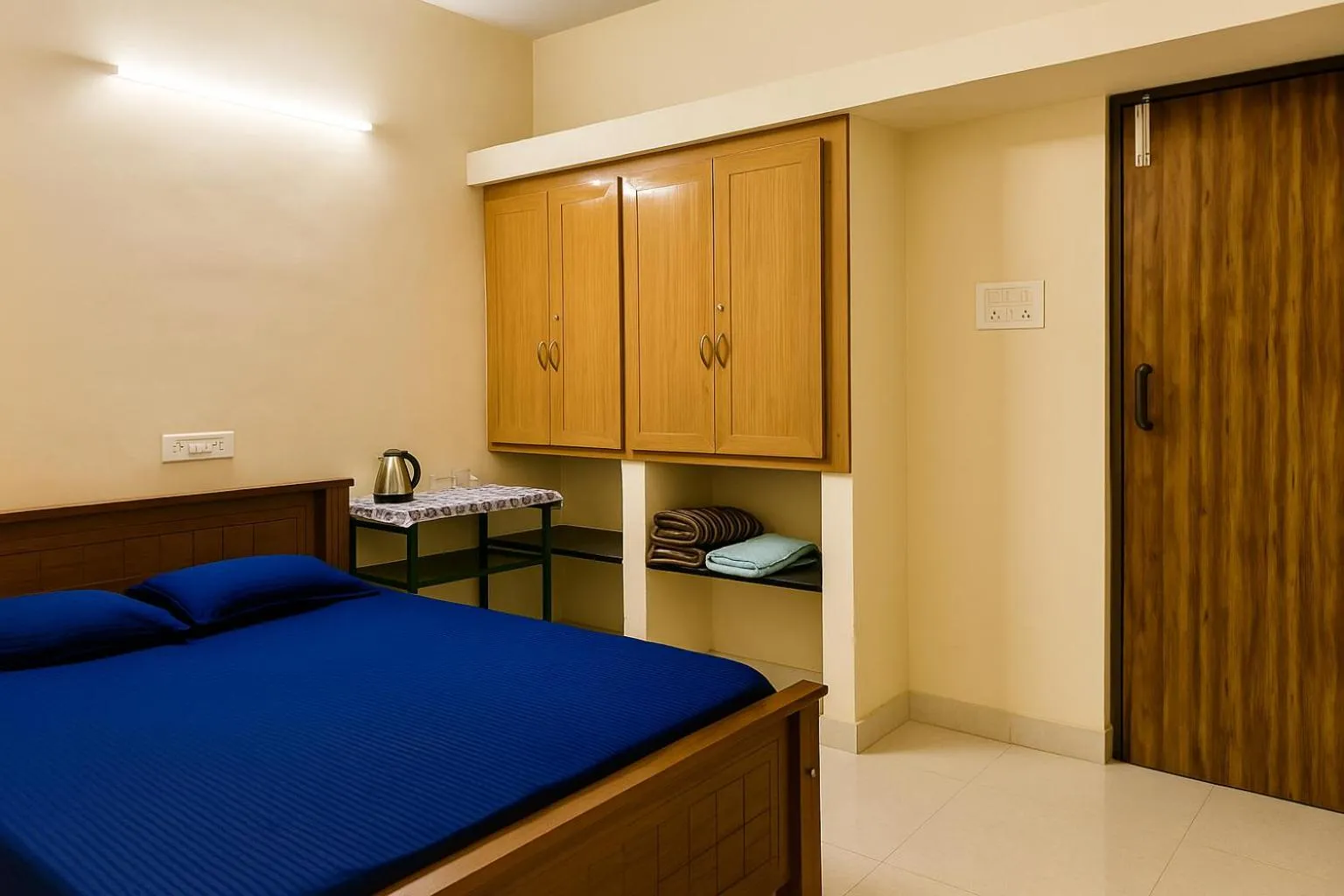 Bed in Sundaram Rooms