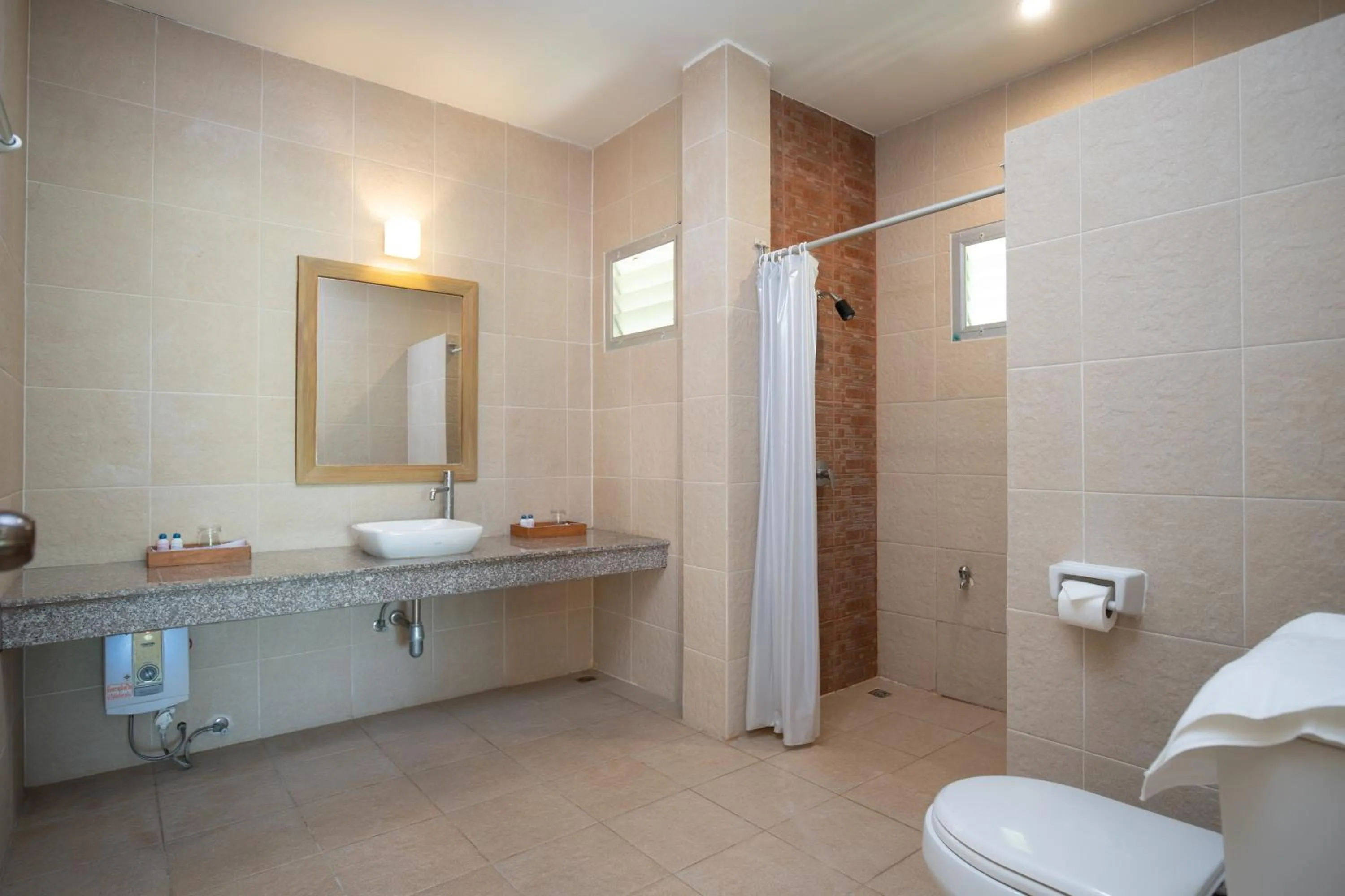 Bathroom in Thara Cholapruek Resort