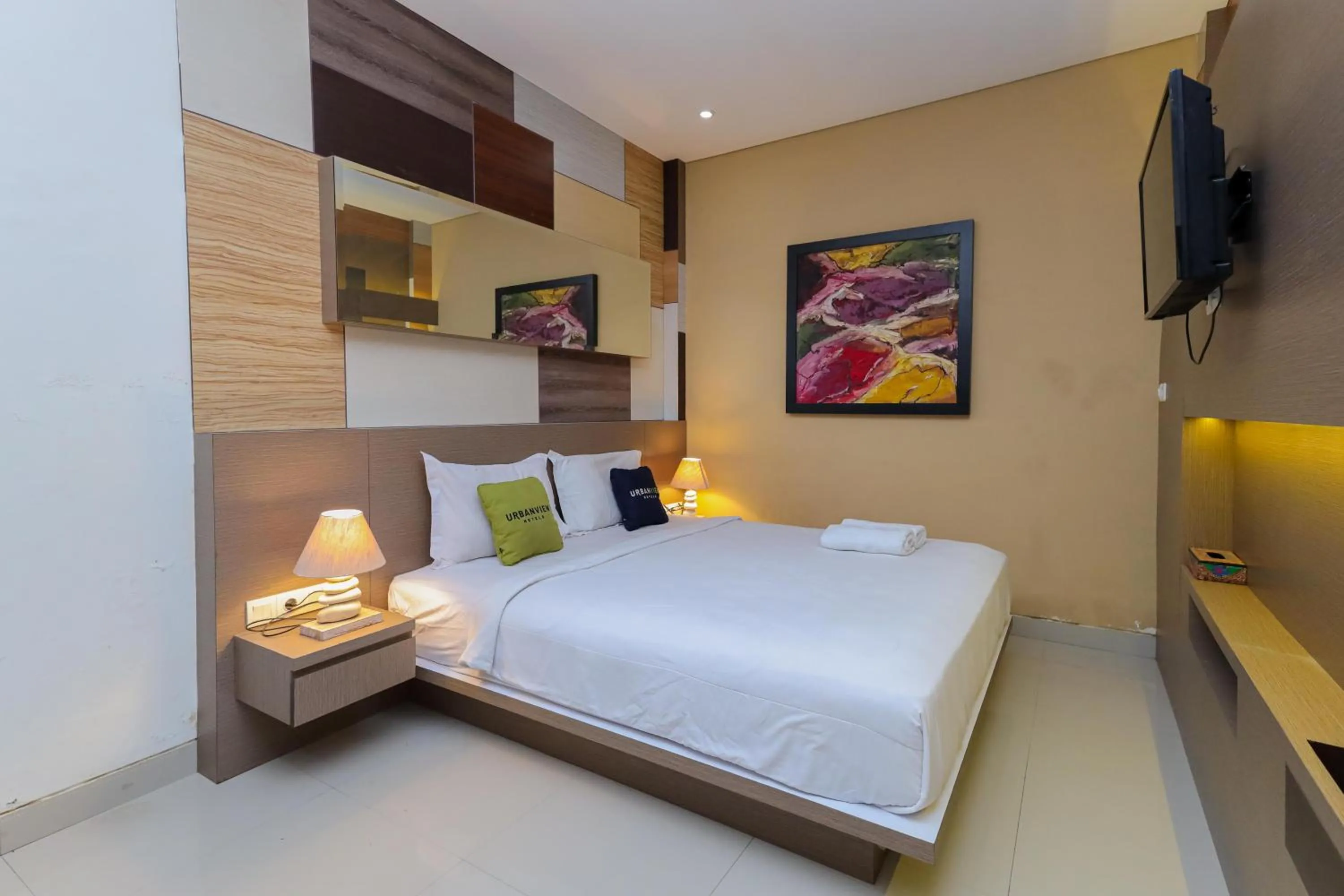 Bedroom, Bed in Urbanview Hotel WG Jimbaran Bali