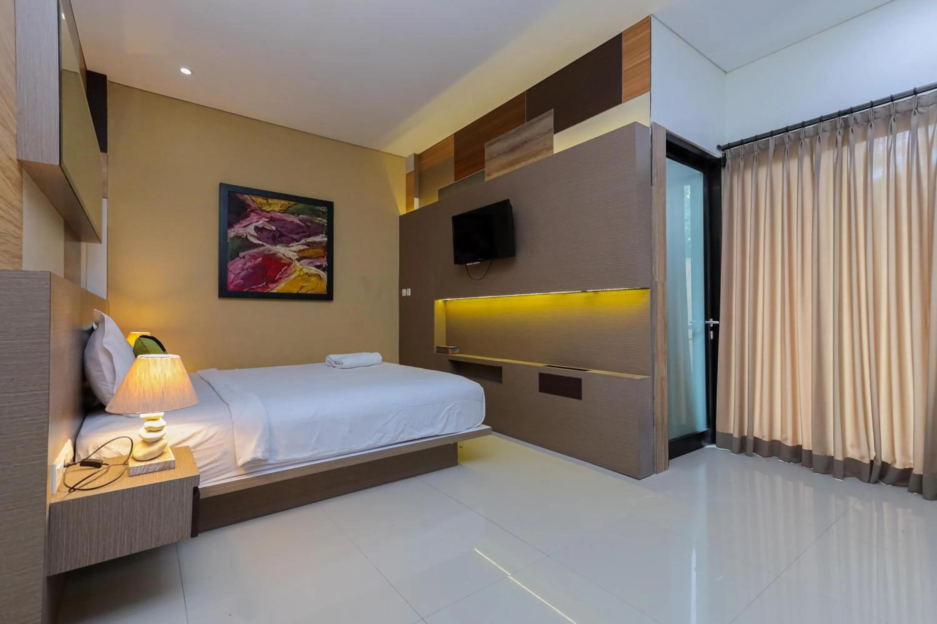 Bedroom, Bed in Urbanview Hotel WG Jimbaran Bali