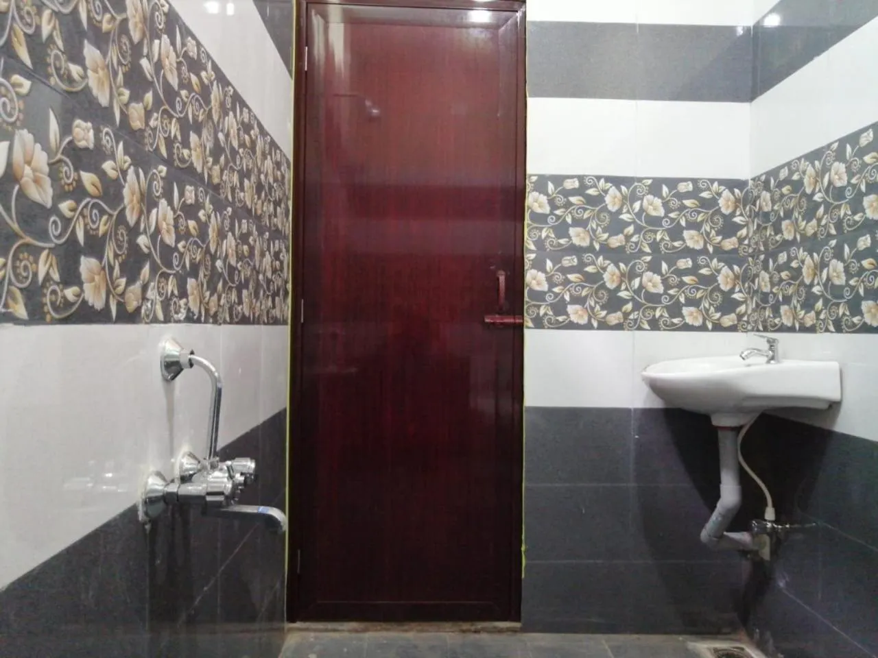 Bathroom in Le Springlynn Residency