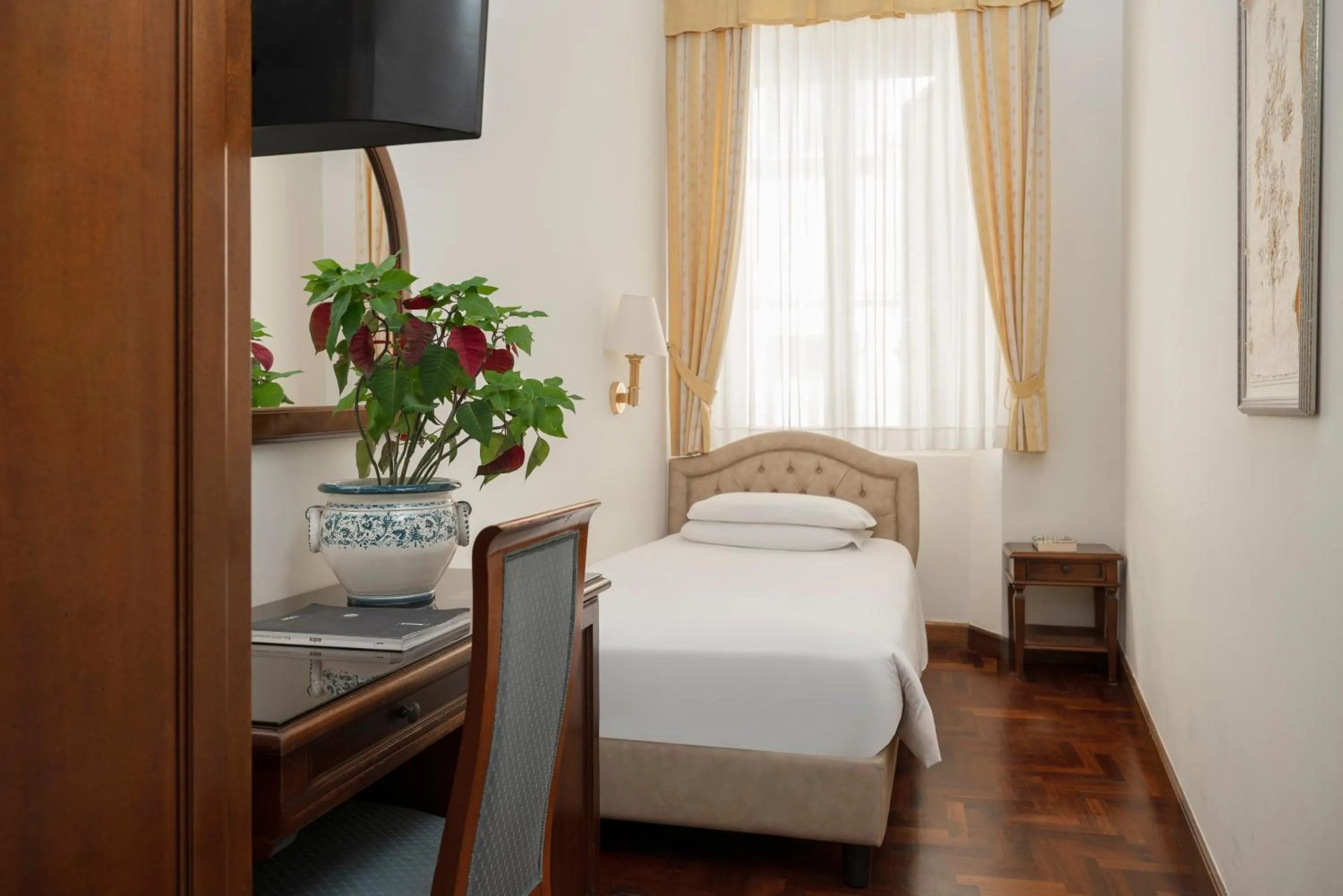 Bed in Hotel Boccaccio