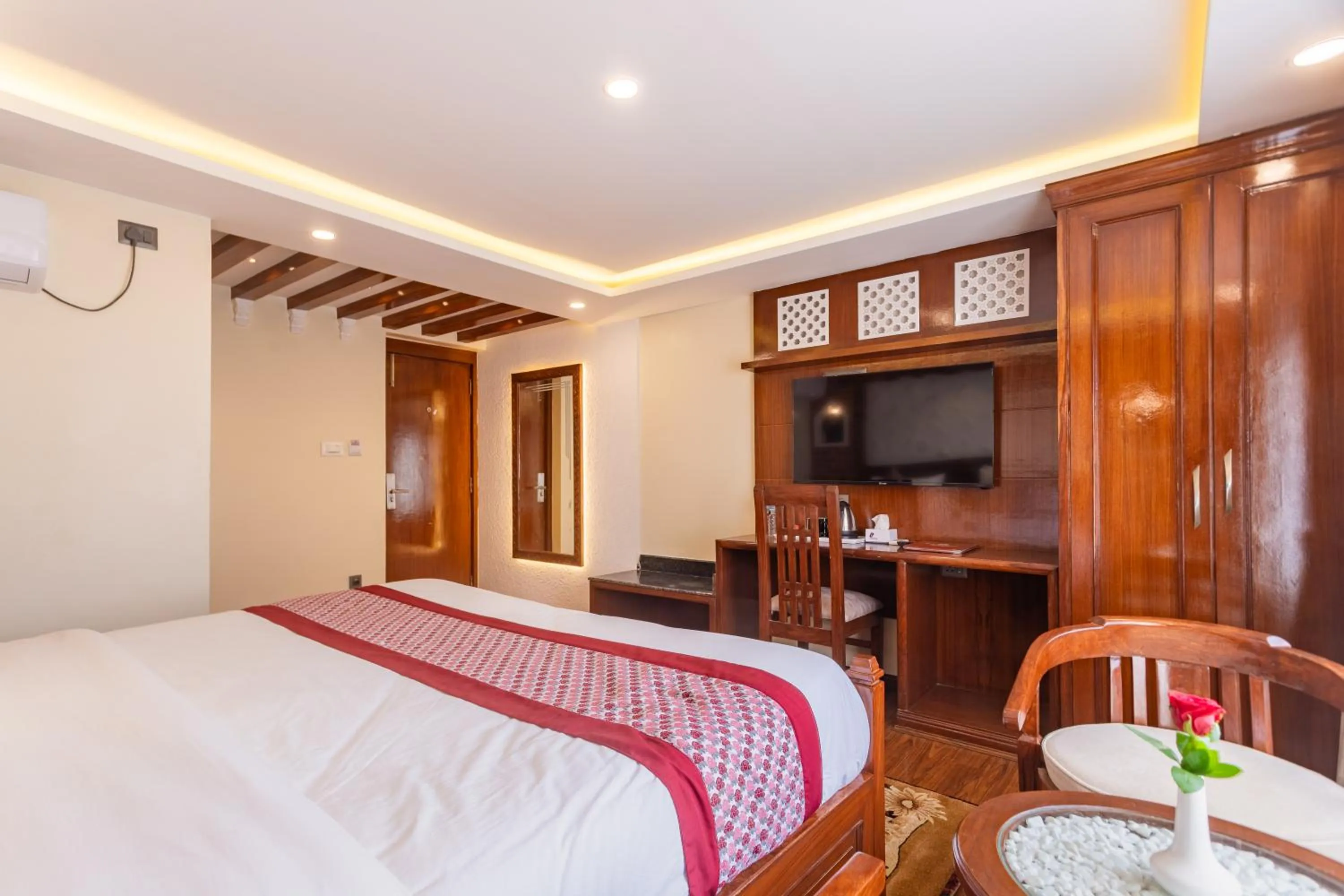 Bed in Amarawati Boutique Hotel