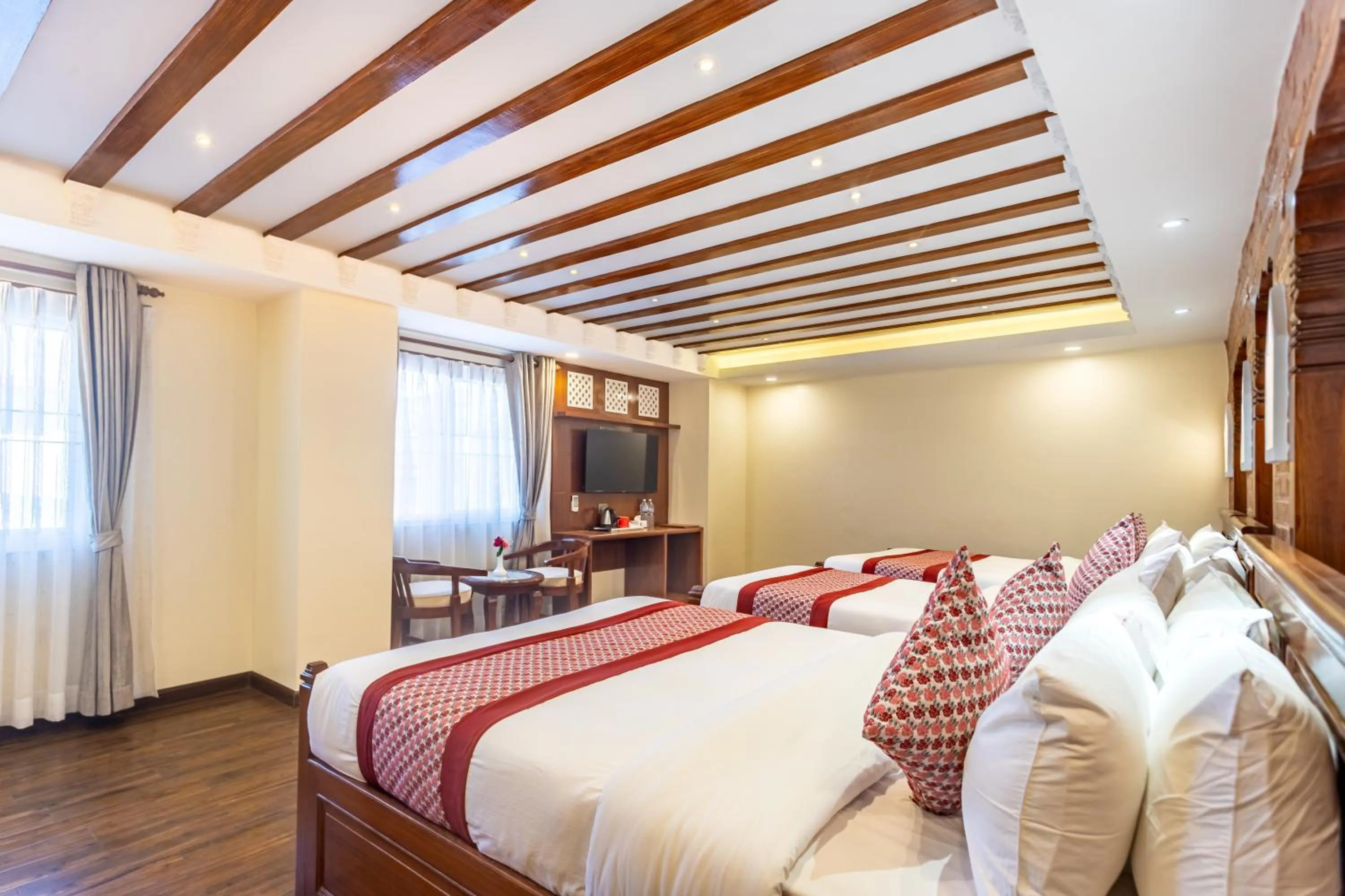 Bed in Amarawati Boutique Hotel
