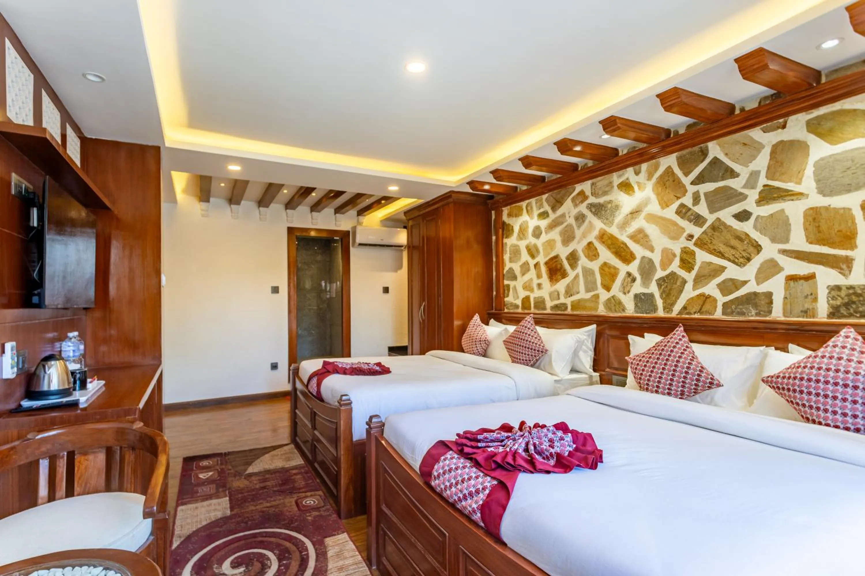 Bed in Amarawati Boutique Hotel