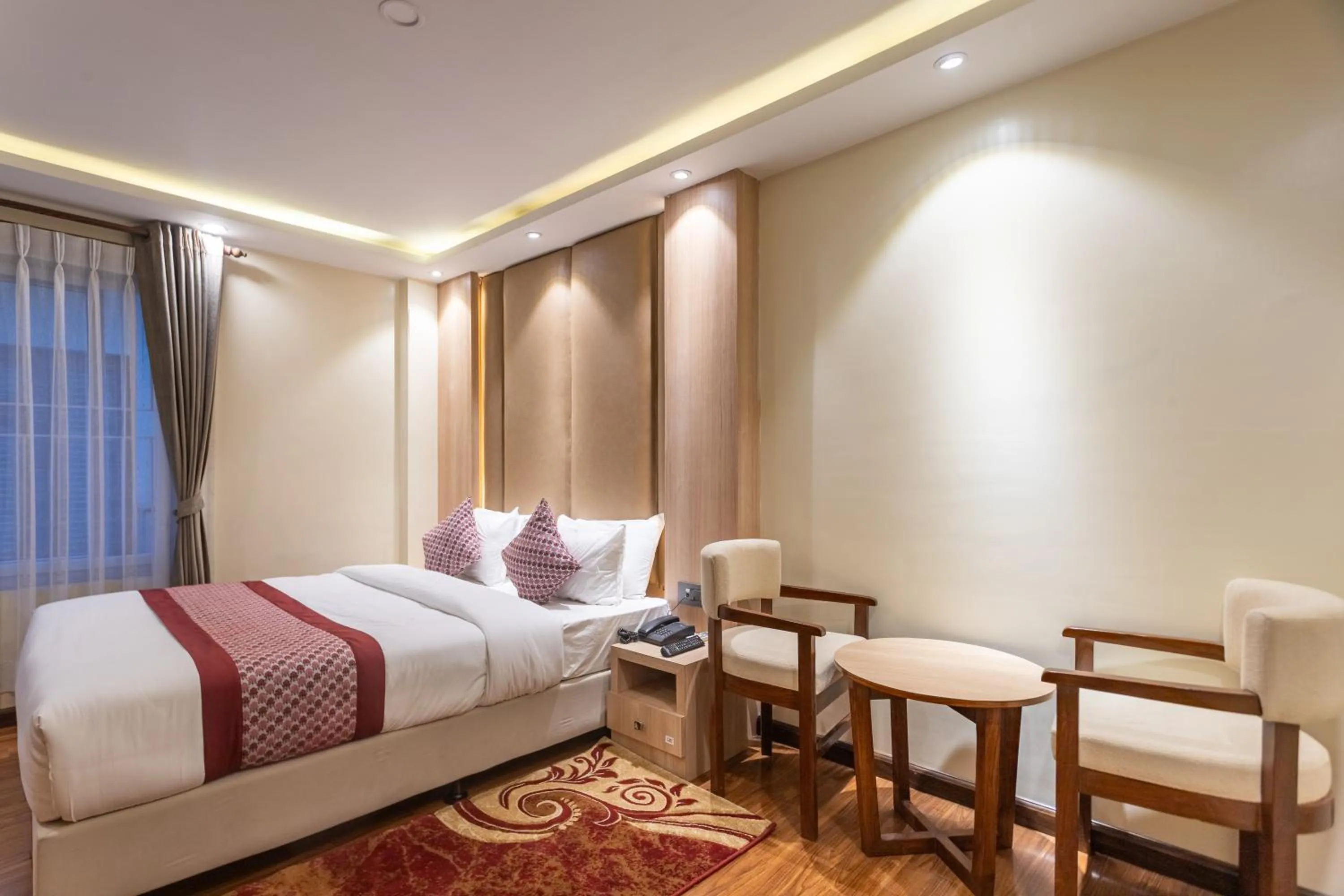 Bed in Amarawati Boutique Hotel