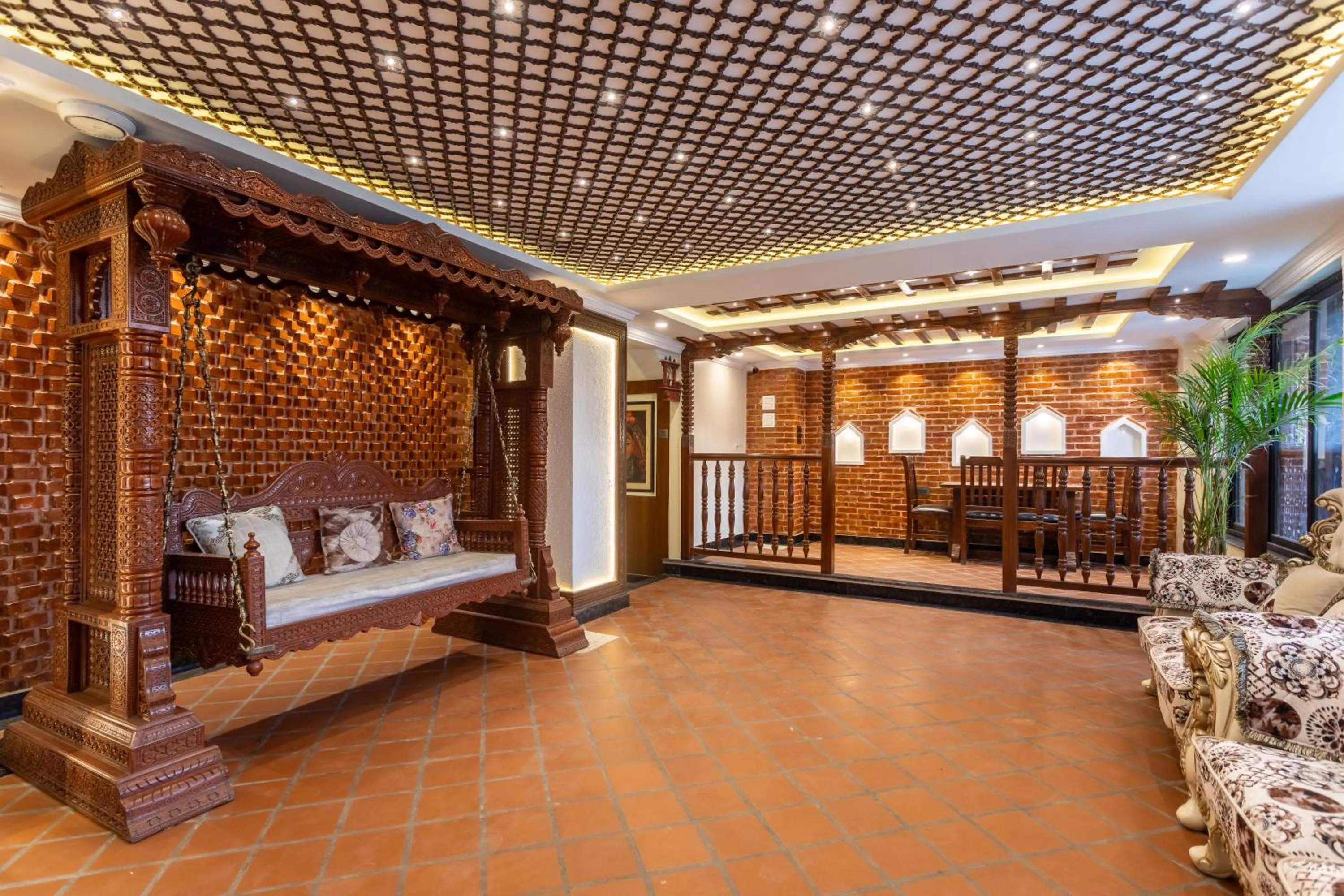 Seating area, Bed in Amarawati Boutique Hotel