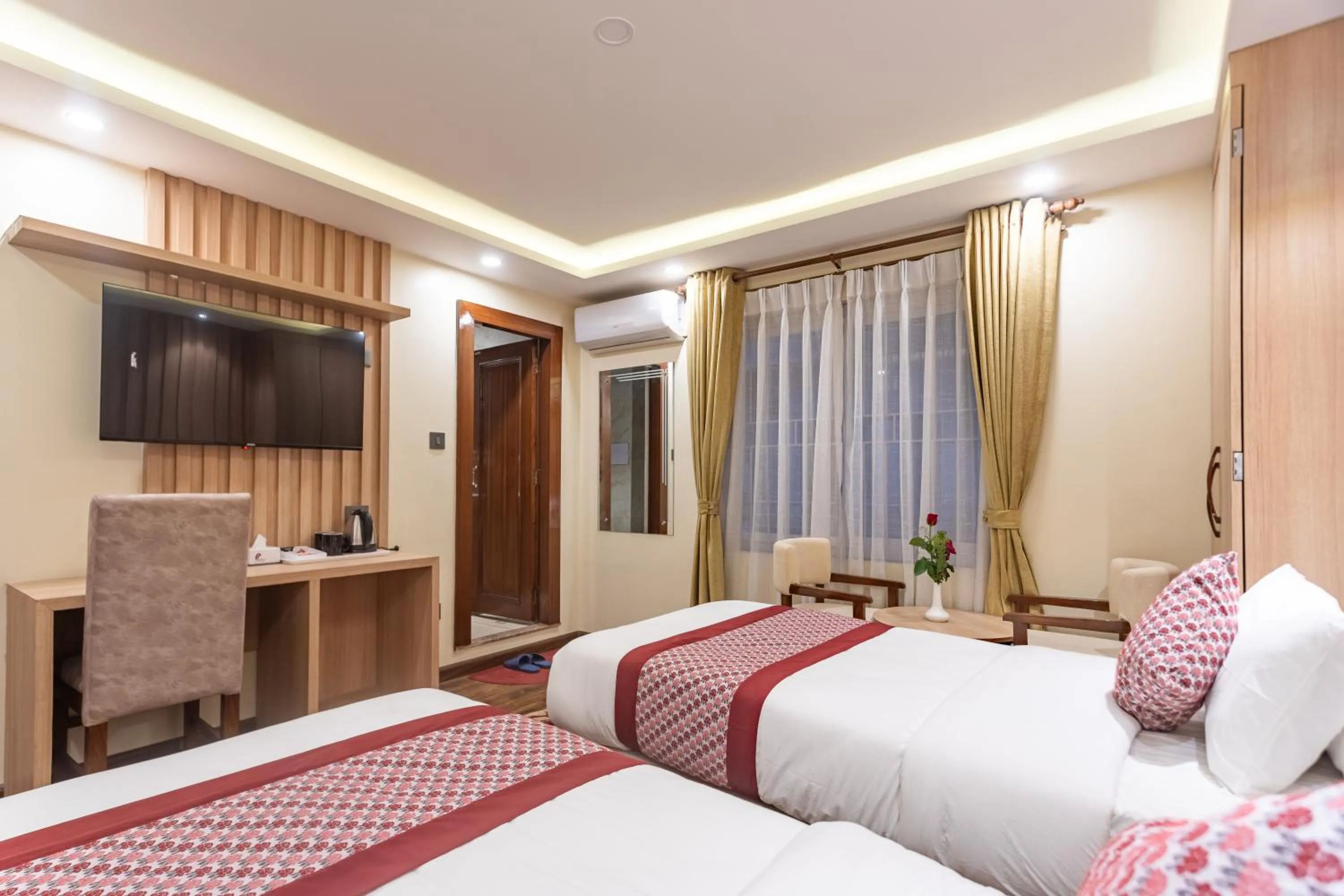 Bed in Amarawati Boutique Hotel