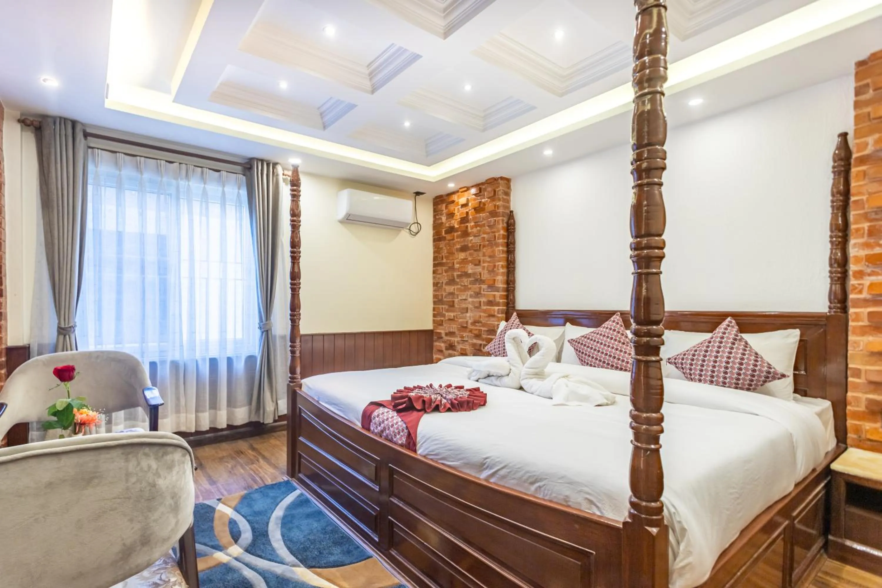 Bed in Amarawati Boutique Hotel