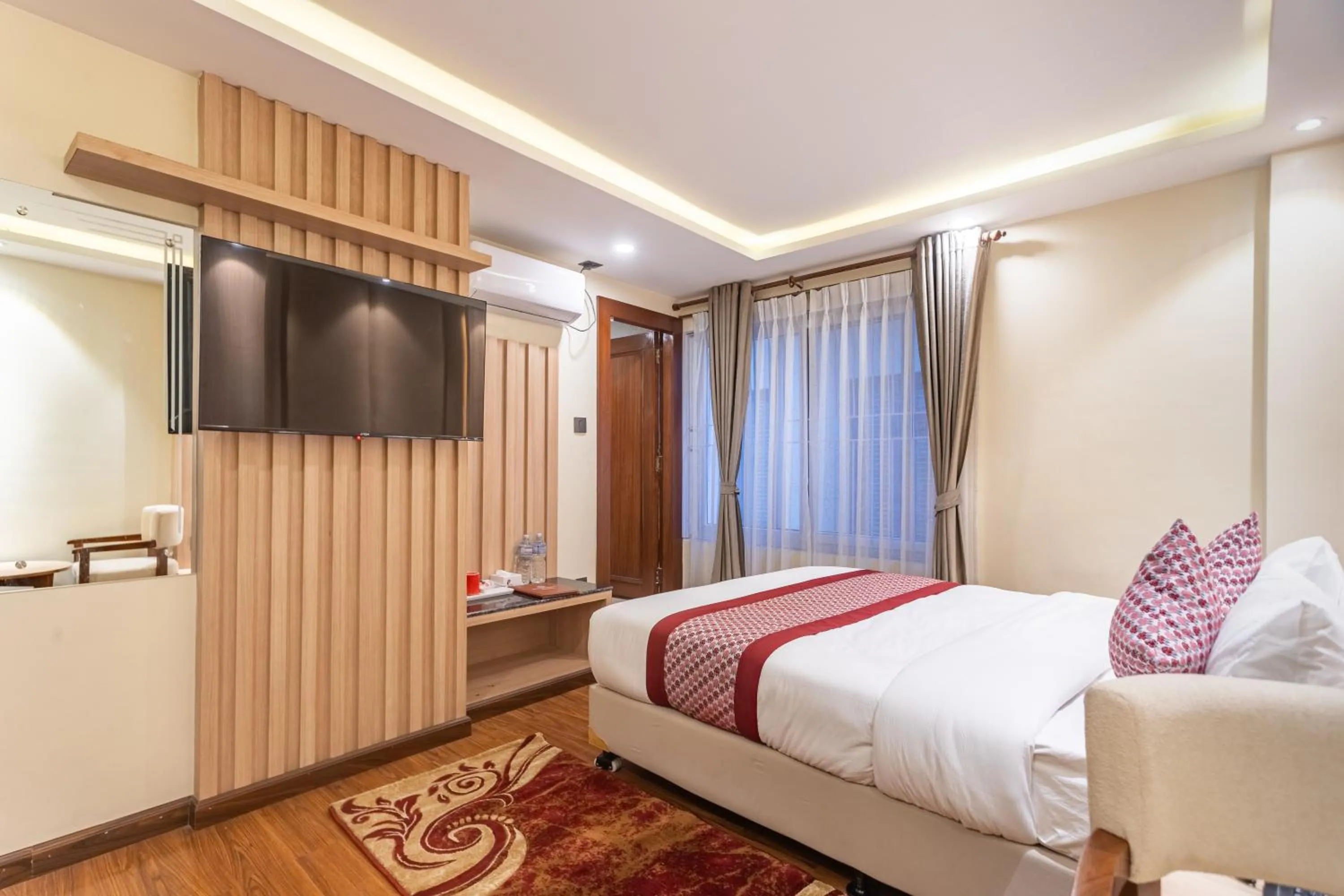 Bed in Amarawati Boutique Hotel